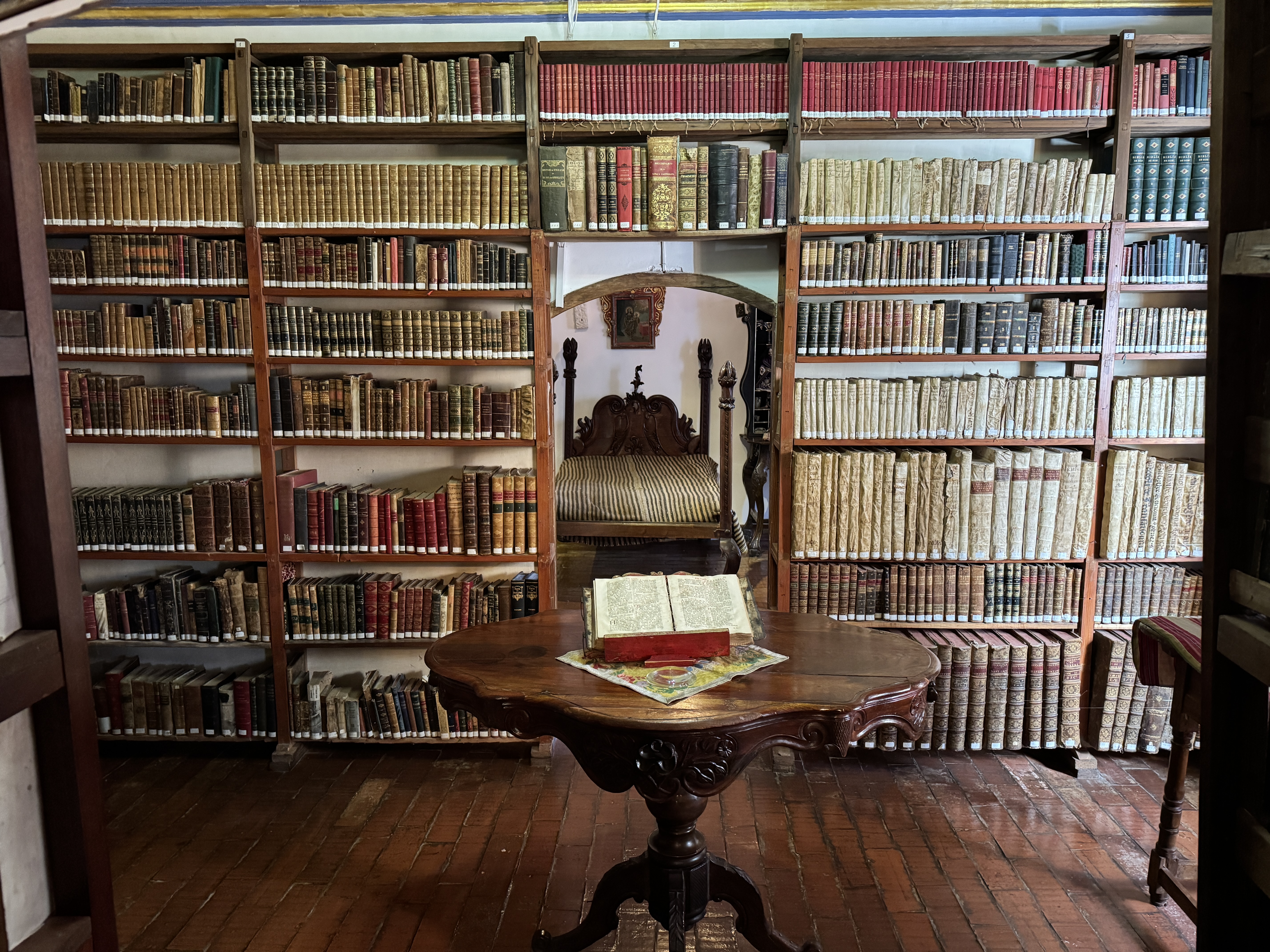 A spectacular library.  Antonio Sucre is said to have slept in that bed.