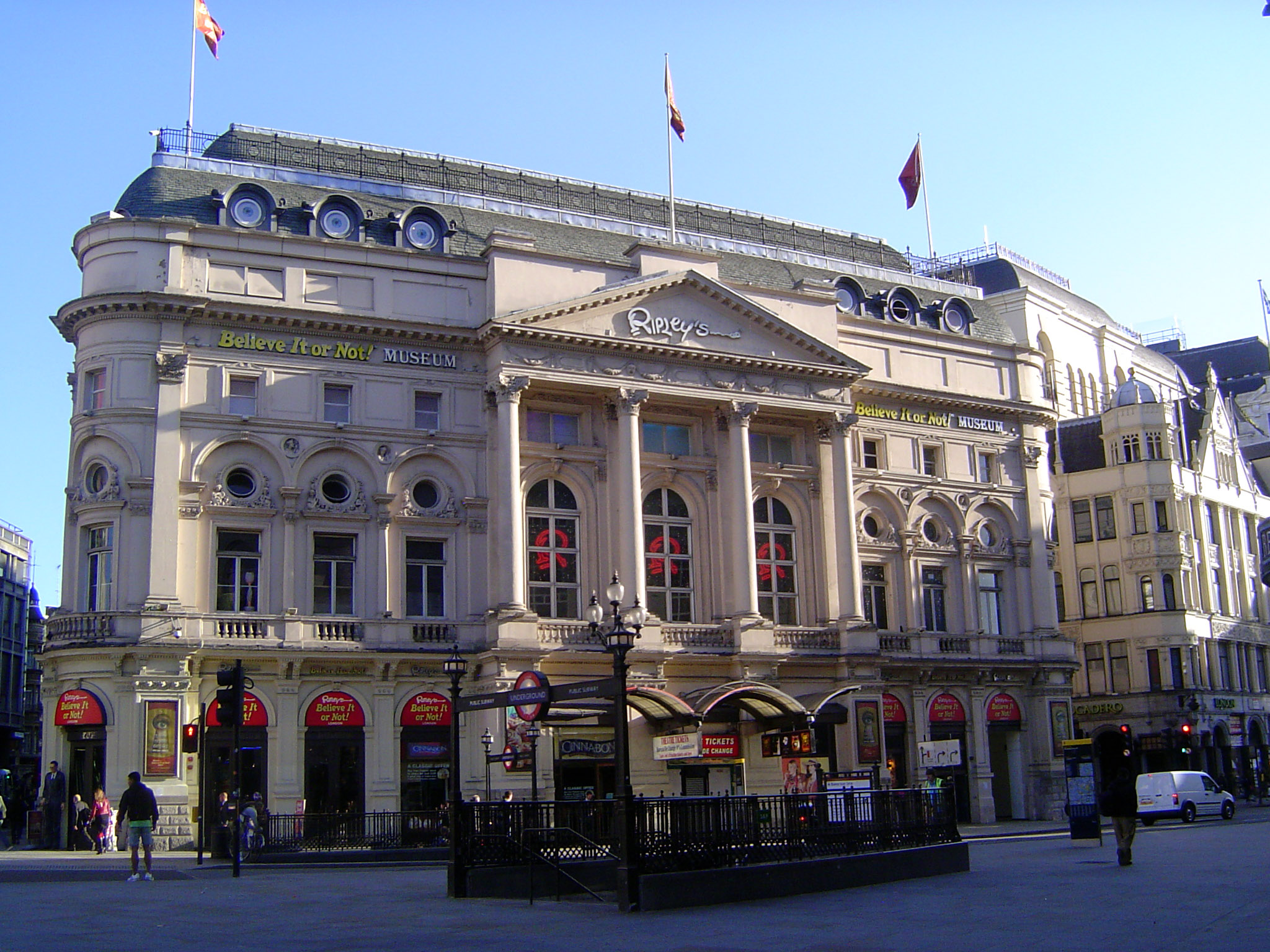 Across the street is the old London Pavilion, in its day the city's fanciest music hall and covering an entire block. In 1885 "the owners ob