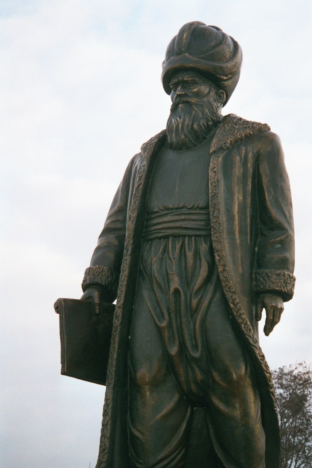 Guess we'd better sober up. Here's a statue of Sinan, the great architect. He stares at an arched bridge at Buyuk Cekmece, a town a few mile