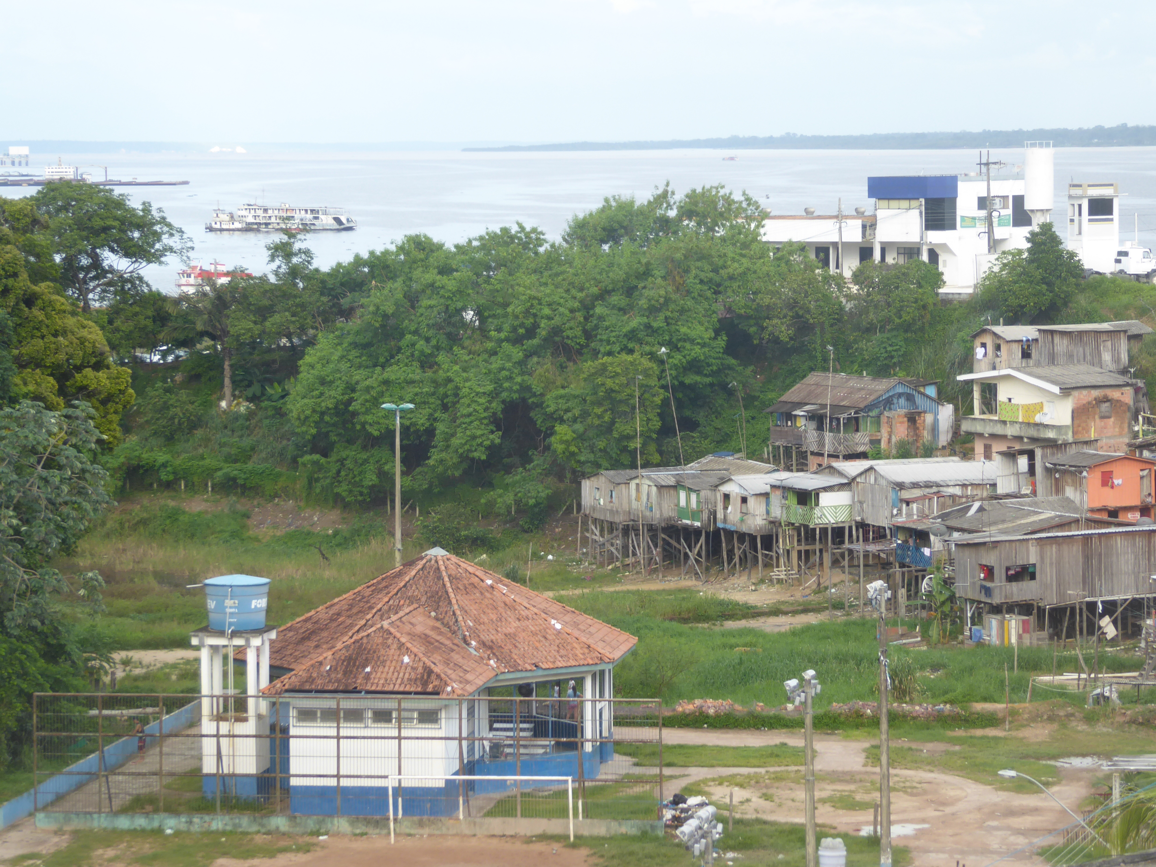 Way off in the distance you can see the color of the river shift to a lighter shade. Welcome to the Amazon proper. If you're a purist, you'l