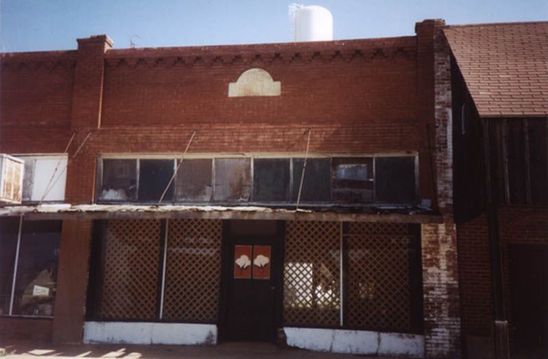 Two counties west of Ringling is a major agricultural county: Tillman County, population 8,000 and falling. Here's a building on the main st
