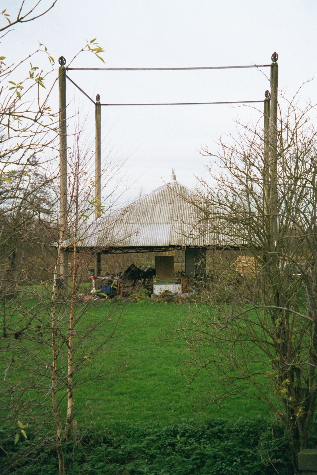 Mostly, though, this is farm country. Here, an ingenious hay shelter, with a roof that can be raised or lowered to match the stack beneath.
