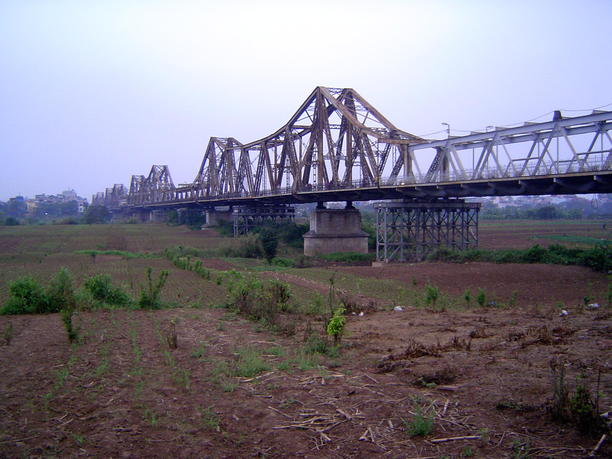 Here's the bridge from an island in the river. The original piers were masonry, and some of the steel work had to be replaced after repeated