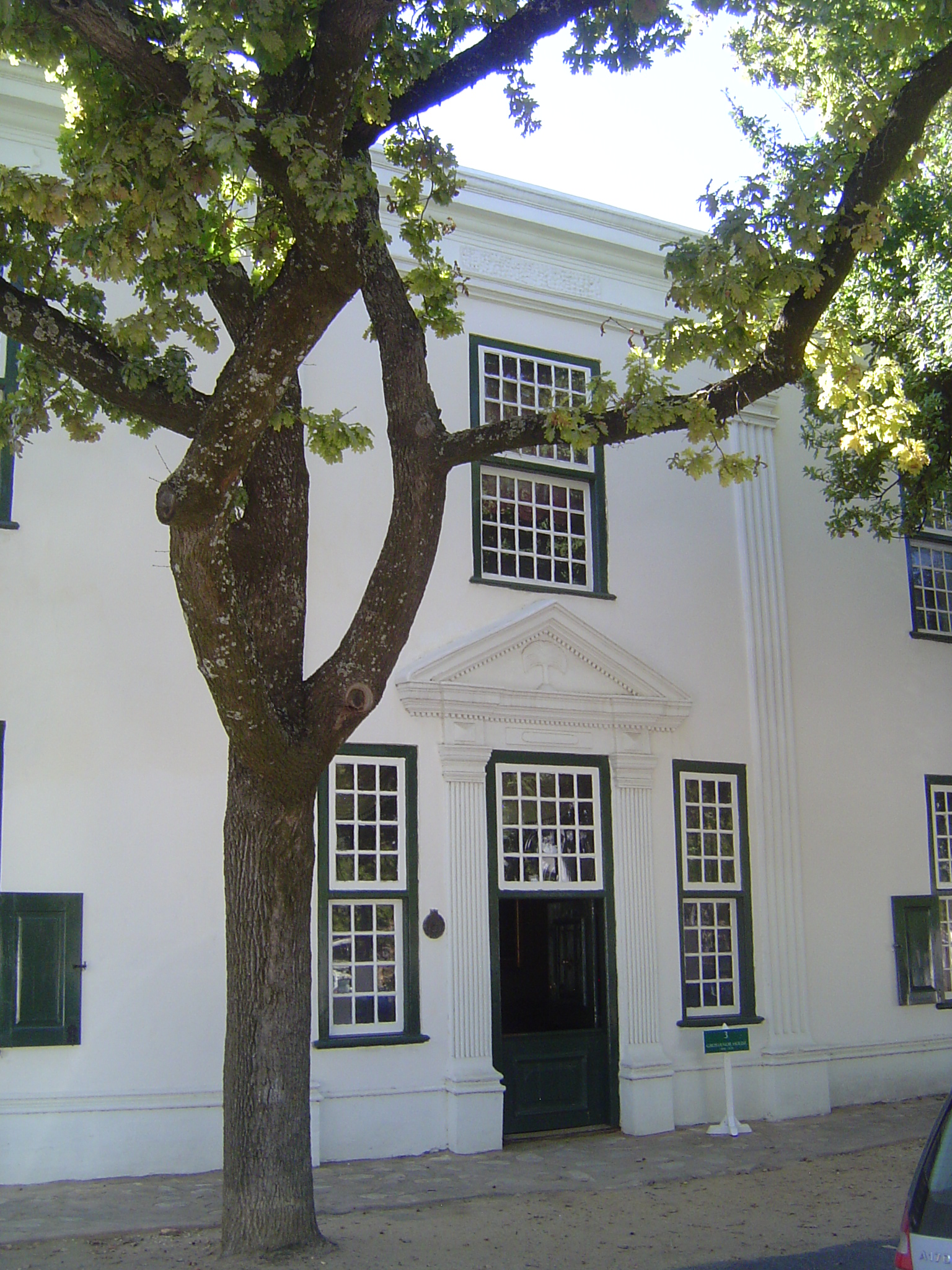 Entrance to the Grosvenor house, which Fransen calls "the finest house in Stellenbosch." It started out one story under thatch. and grew to