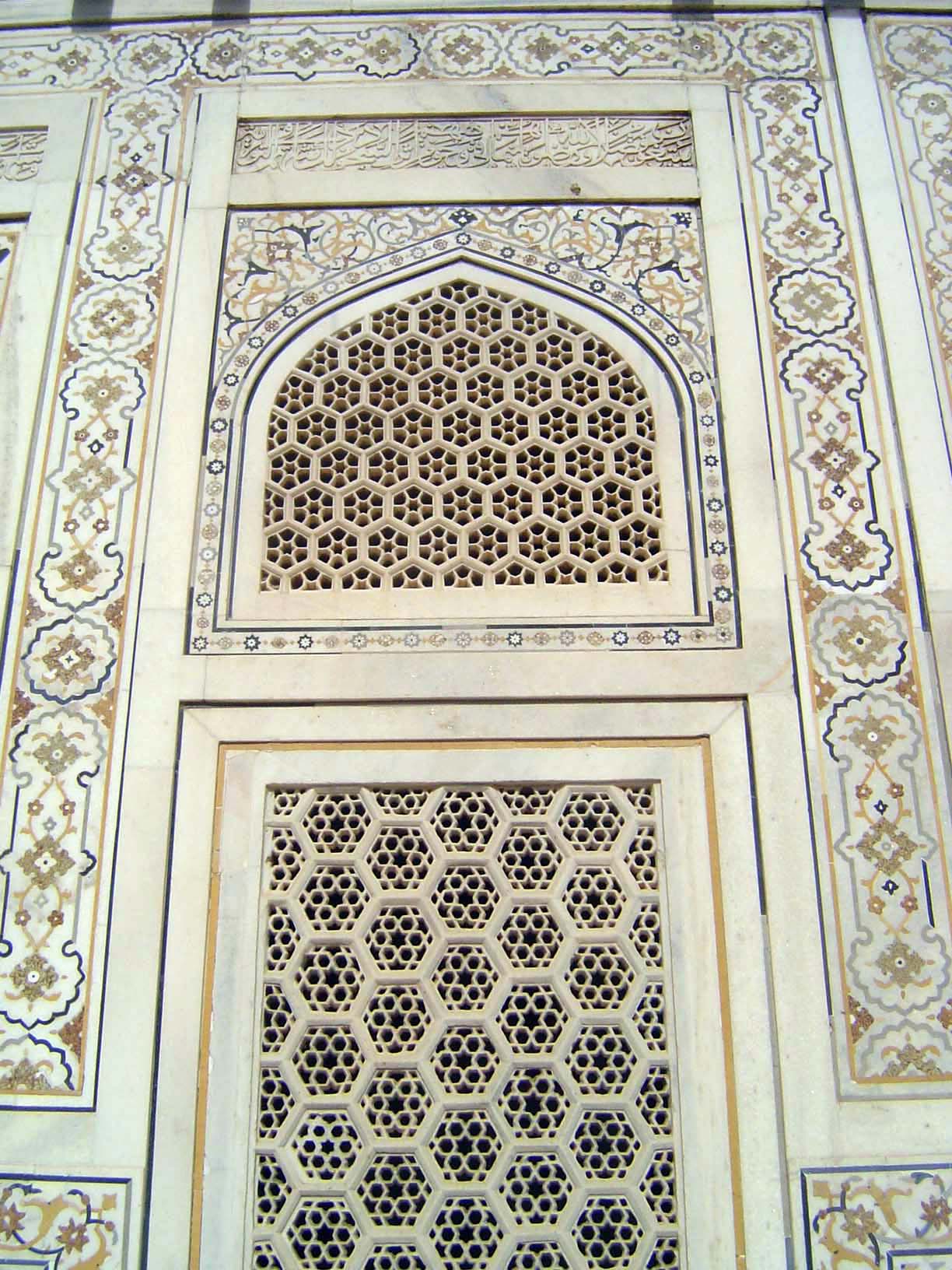 Close-up of a jali with surrounding inlay.