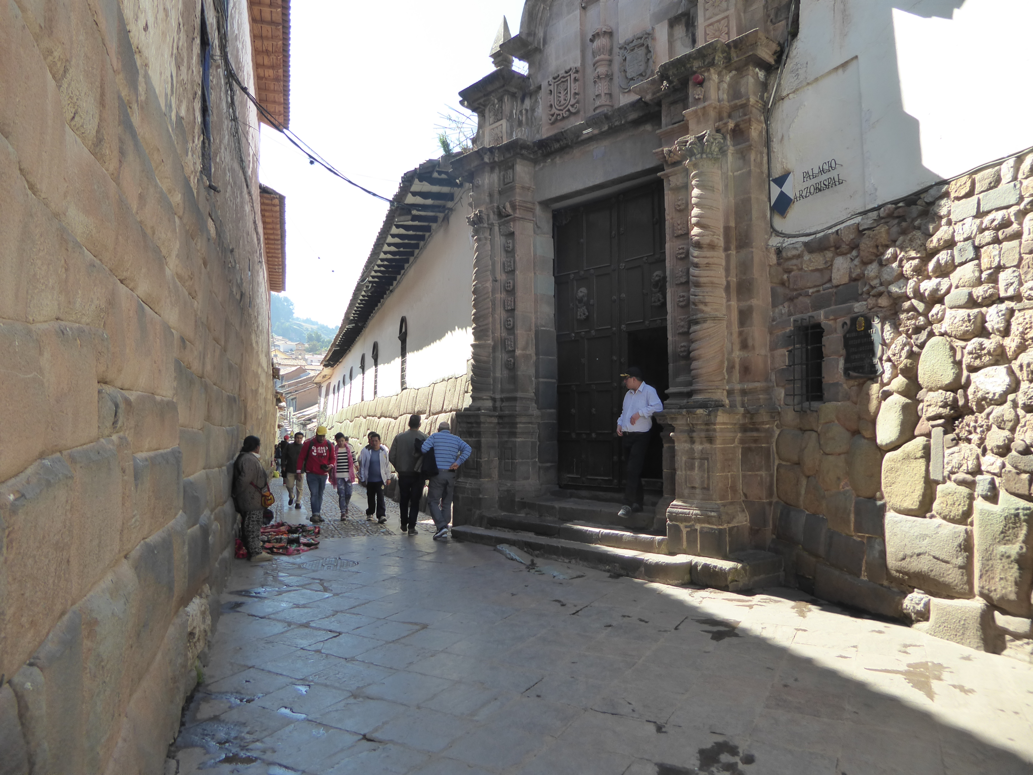 Here it is in 2018, repaved and with most of the overhead wiring relocated. The street is called Hatun Rumiyoc, Quechua for "great rock."