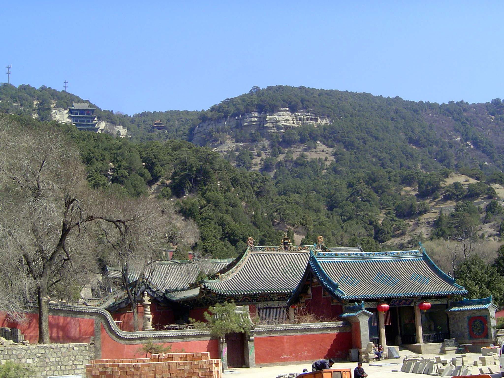 This is Tian Long Shan, Heavenly Dragon Mountain, and the road from Jinci comes over the top about where those power poles are on the skylin