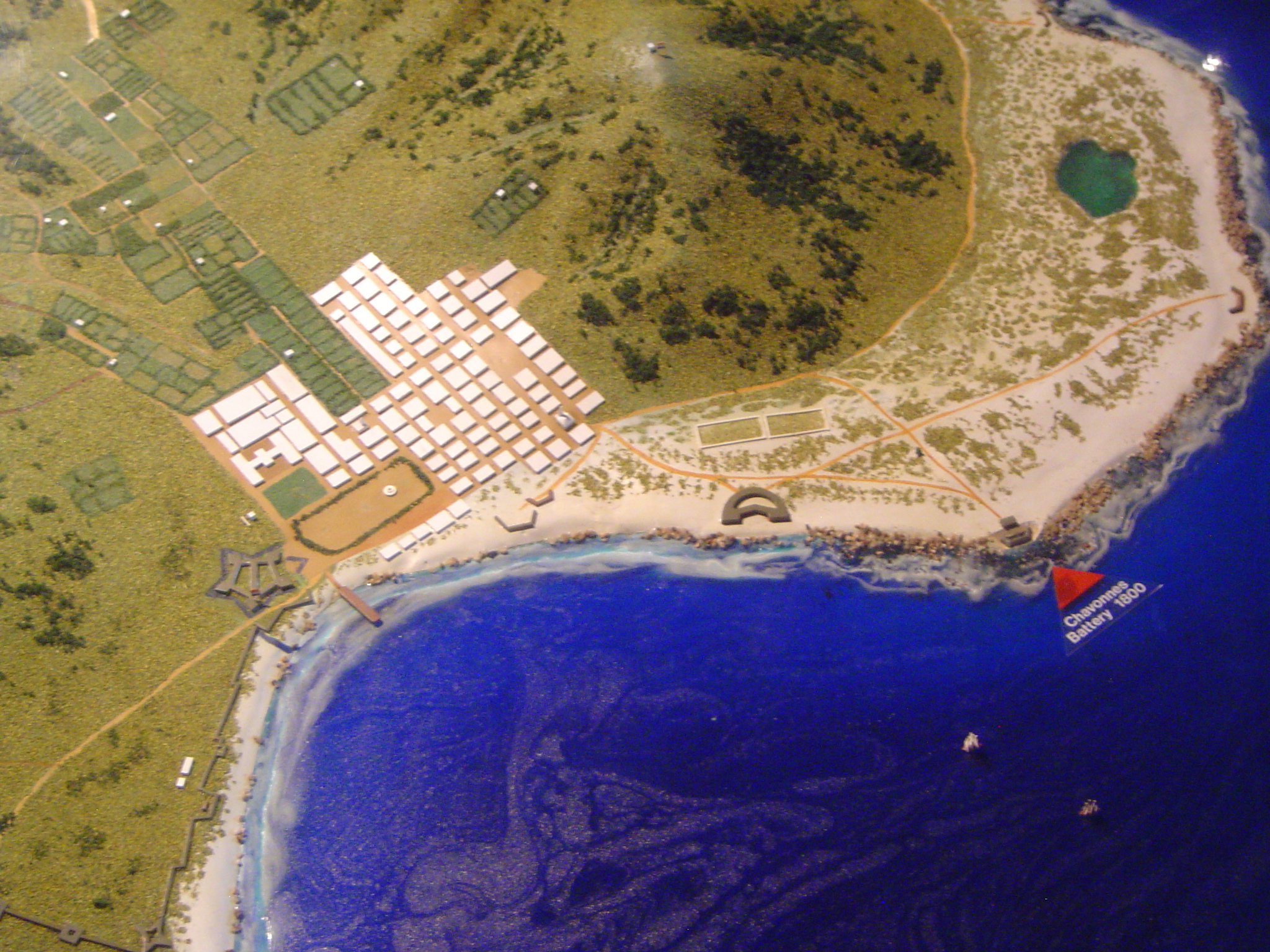 A handy museum model of Cape Town in 1800 highlights in red 1 a bit of coastal fortification, 2 the prominent Amsterdam Battery shaped like