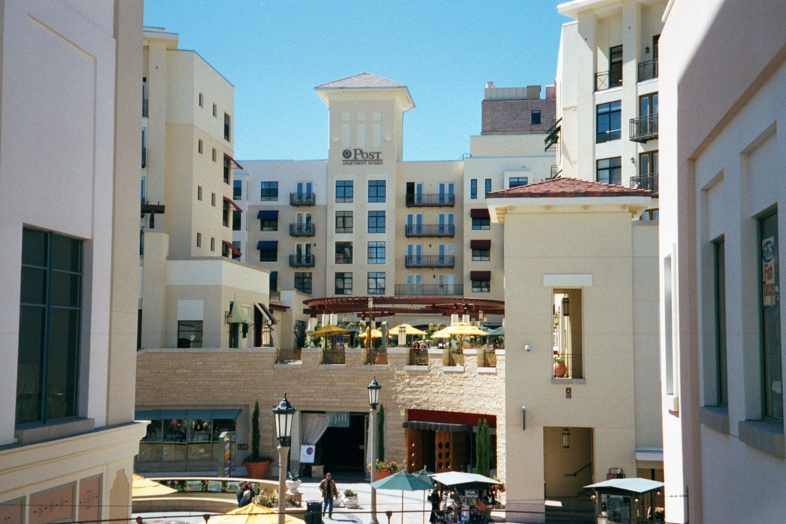 It's another venture in the New Urbanism, with shops developed by Trizec of New York and, above them, expensive apartments developed by Post
