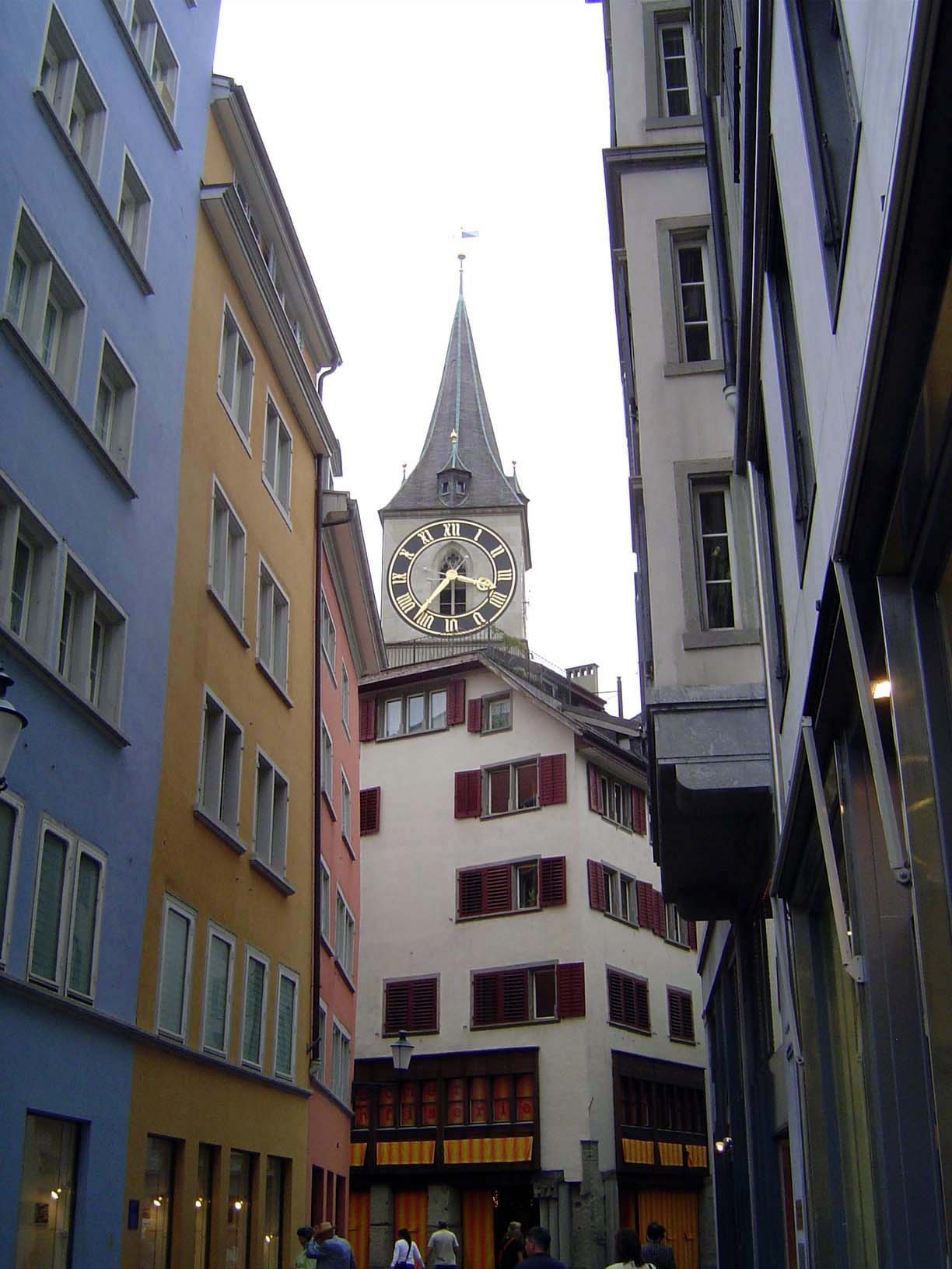 The older part of the city hugs the river and prospers with tourists, seemingly oblivious of high prices. The peeping spire belongs to the P