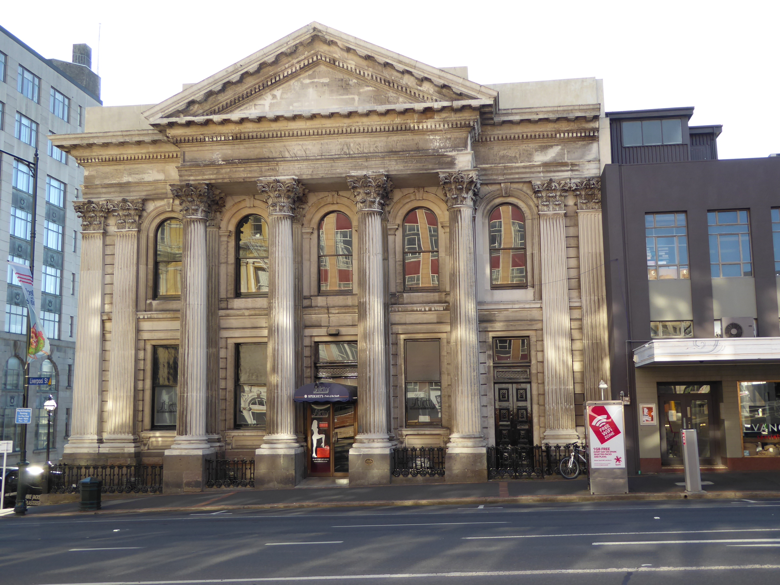 The last surviving Greek temple in Dunedin. Now it's Stilettos Revue Bar, but when built in 1874 it belonged to the Union Bank. Later photog