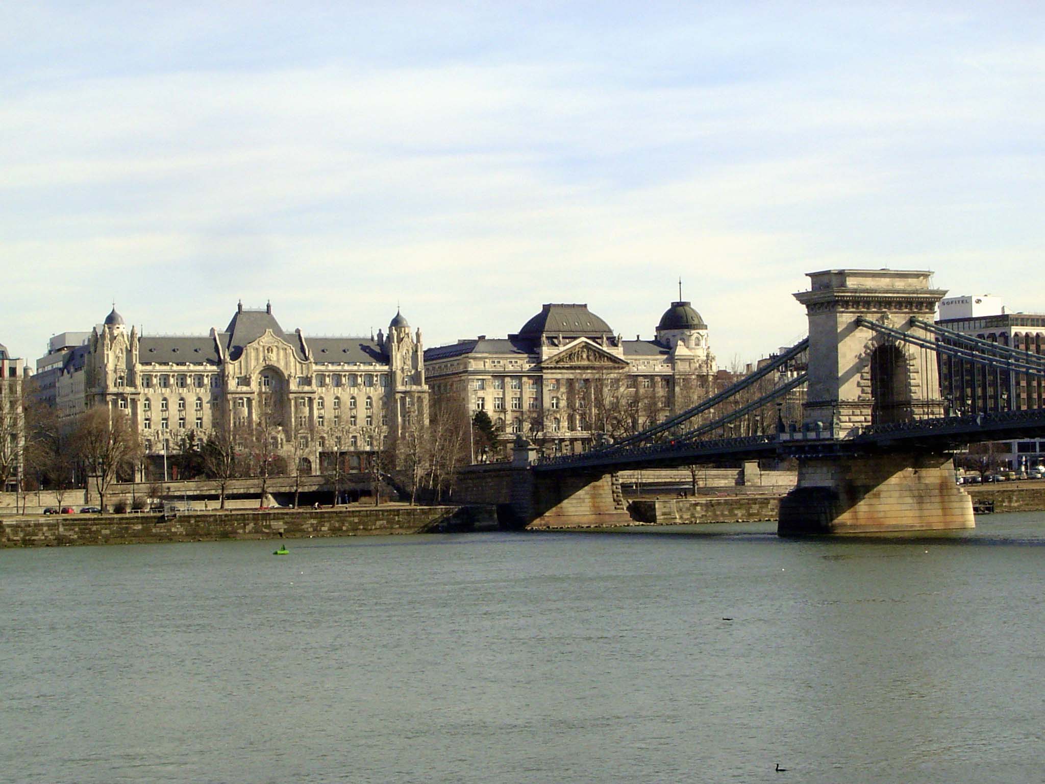Time to cross over. Here, from near the river, is the Chain Bridge again, along with the Gresham Palace and its more traditional twin, which