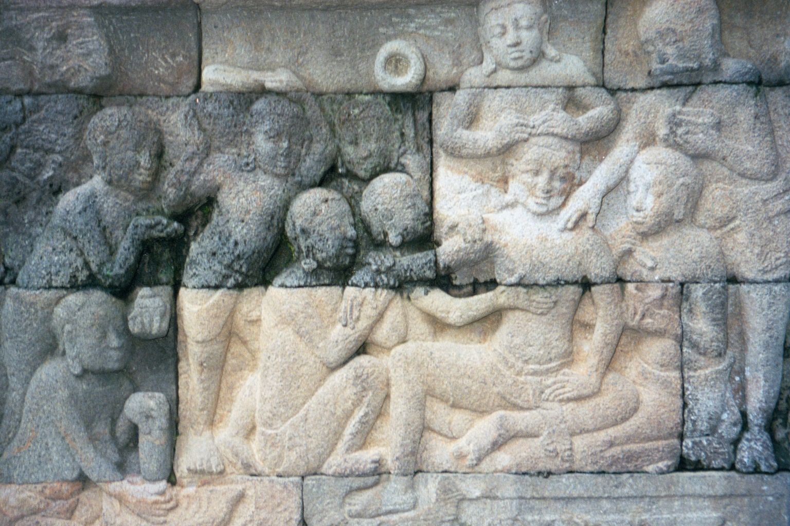This, on the right, seems to show a woman being cared for.