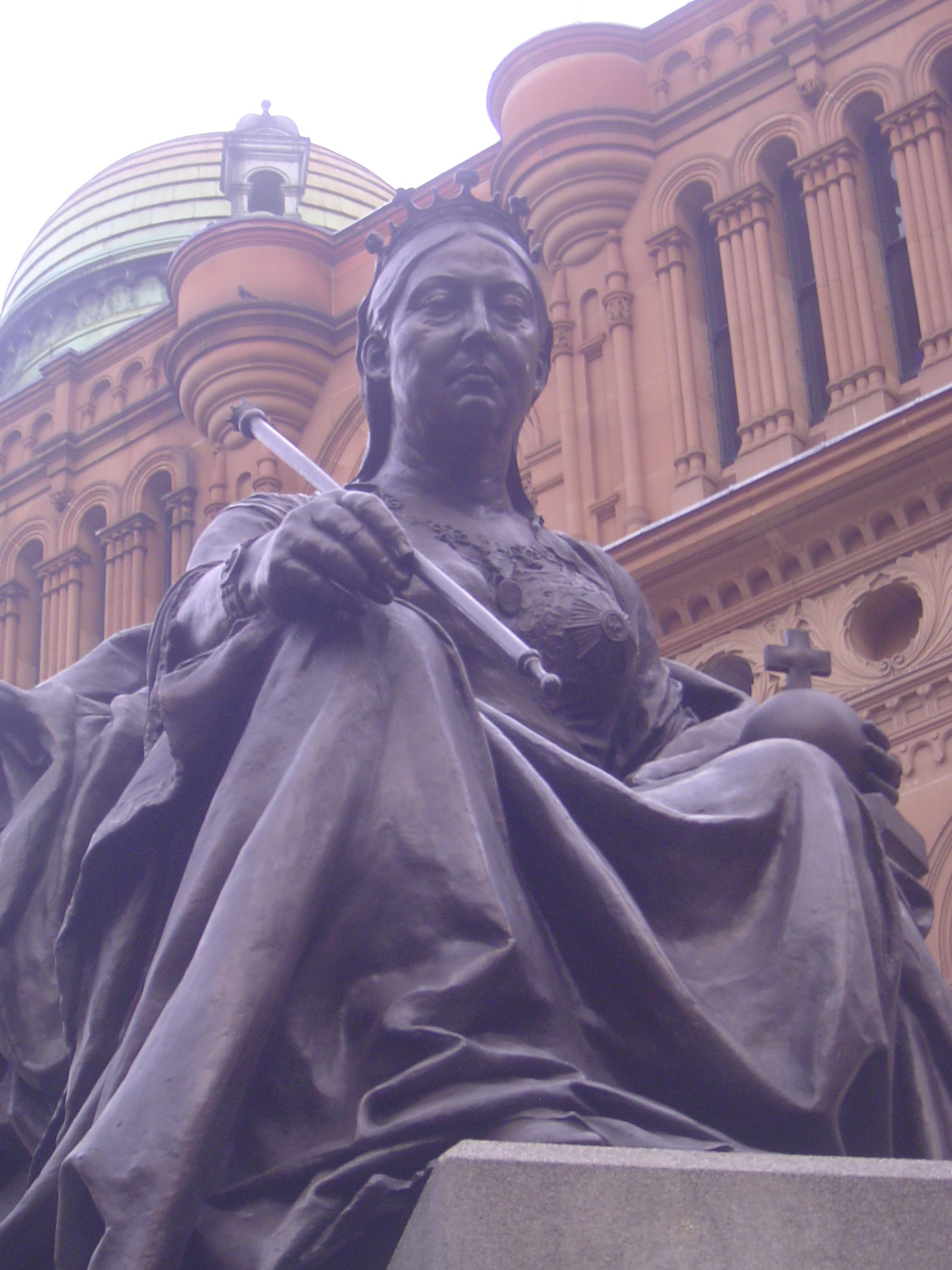 Next to the building in another of those "she's not amused" statues of Victoria. She arrived here in 1987 and perched in what had been a tra