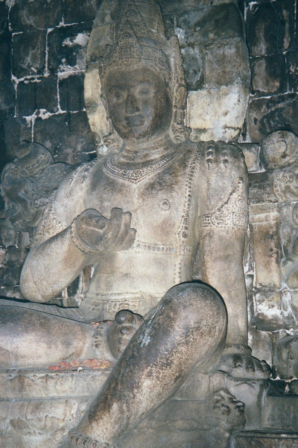 Next to him, Lokesvara, the Compassionate Buddha.