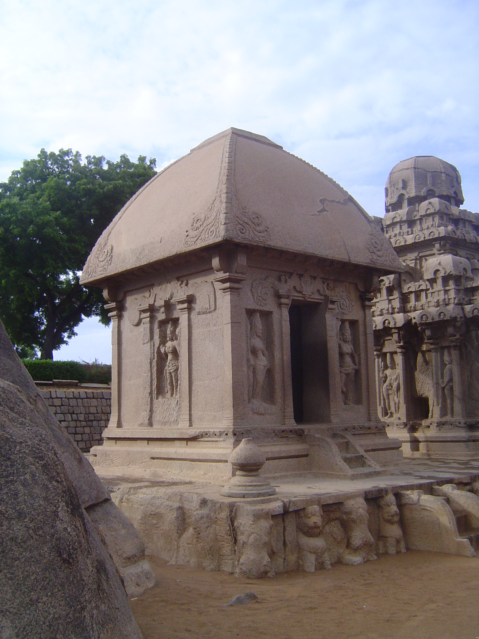 This one is called Draupadi. It's a stone version of a simple village shrine to Durga. The roof imitates thatch, trimmed at the corners with