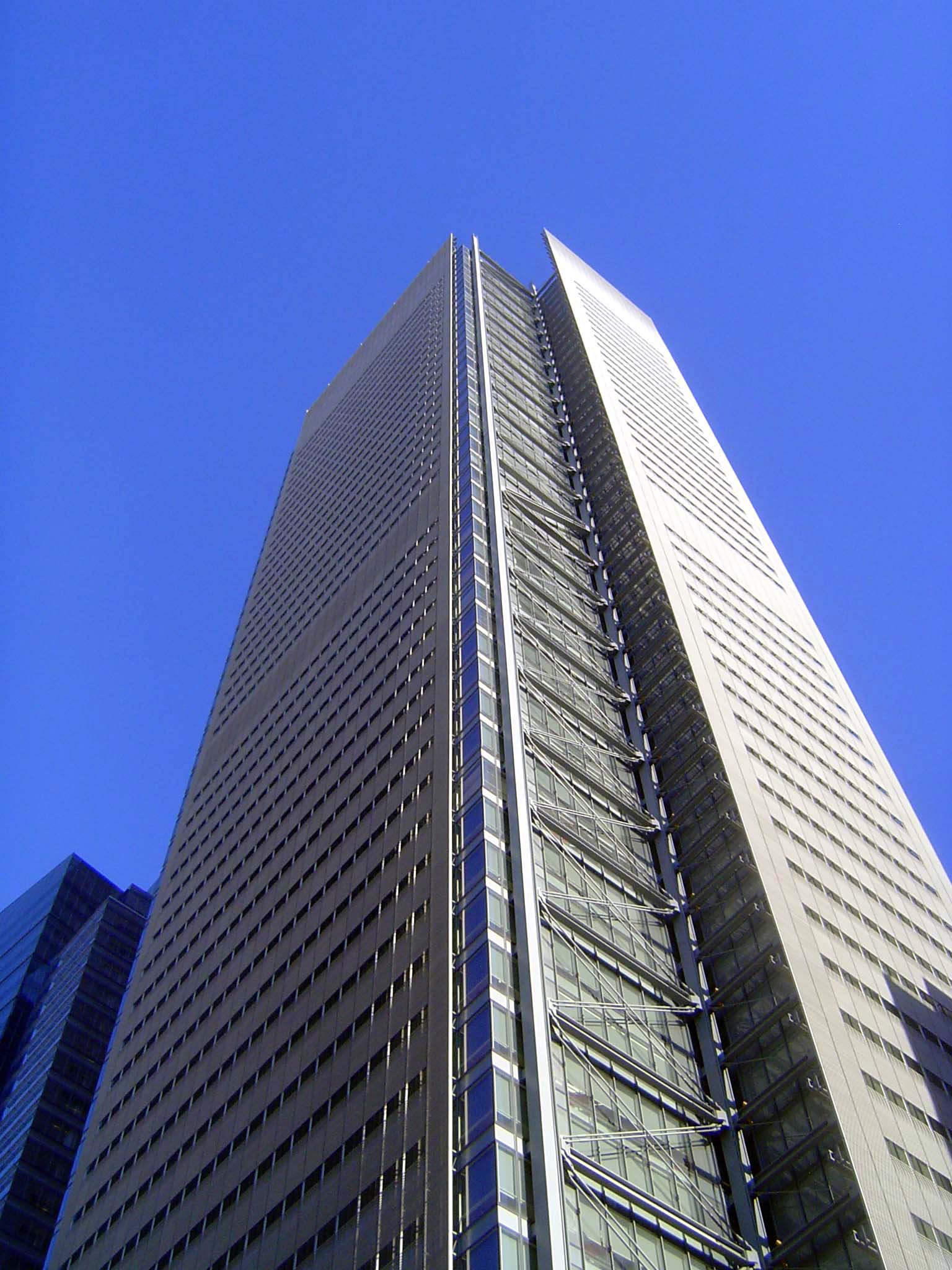 The New York Times Building, designed by Renzo Piano, opened in 2007 at Eighth Avenue at 40th.
