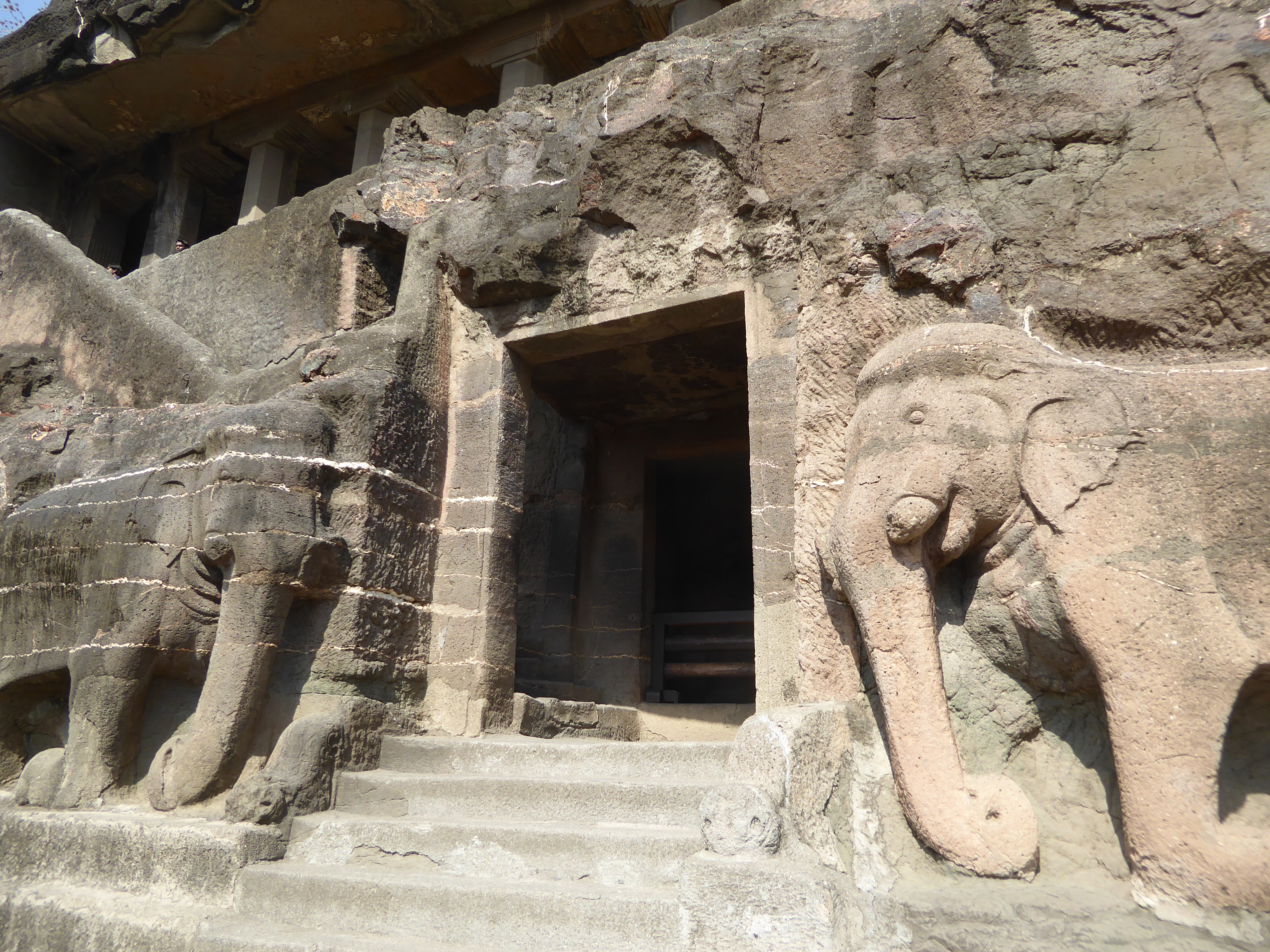 Here's Cave 16 above its grand entrance. The elephants have lost their tusks. The cave is often described as the prime minister's cave, a re