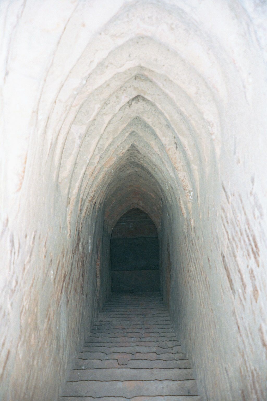 The stairs, traditionally, are hidden to the side.