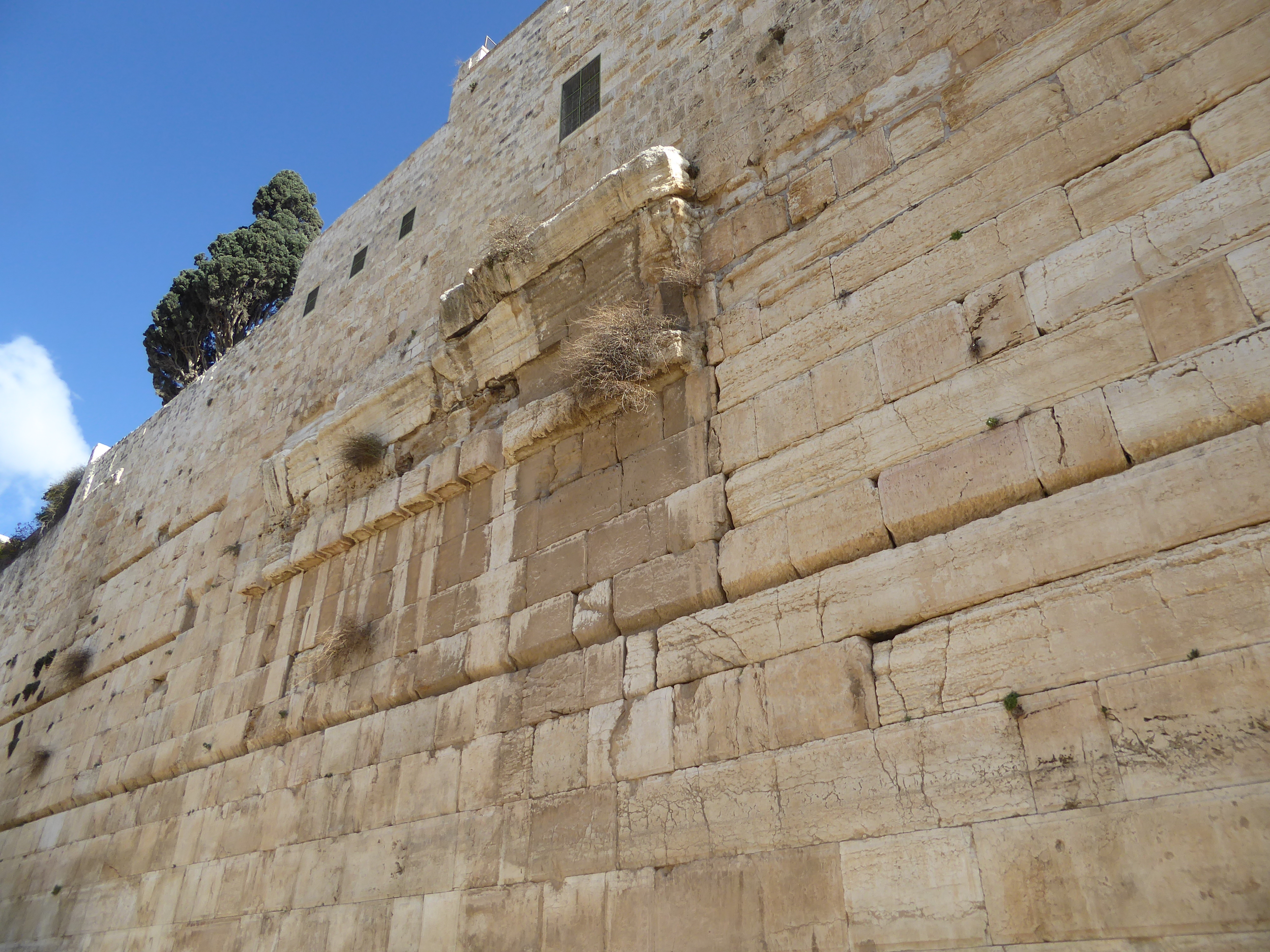 The stones are the only surviving bit of Robinson's Arch, which once supported a huge flight of stairs rising from the left. Built by Herod