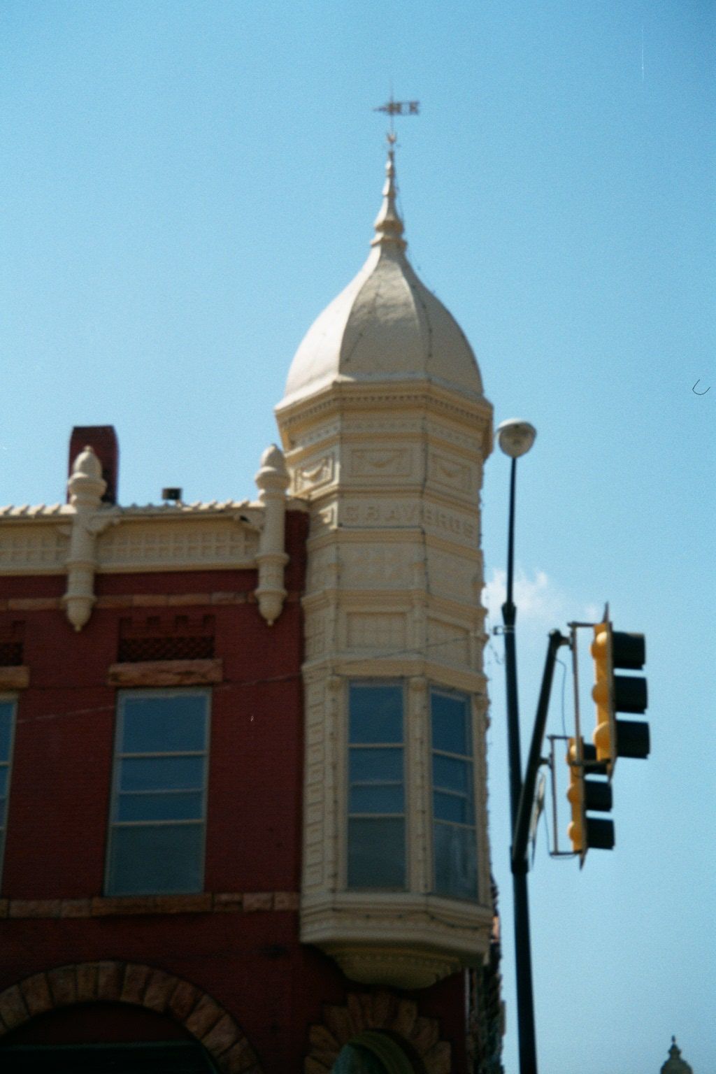 The Gray Brothers building, once a grocery and bank, had a capped oriel.