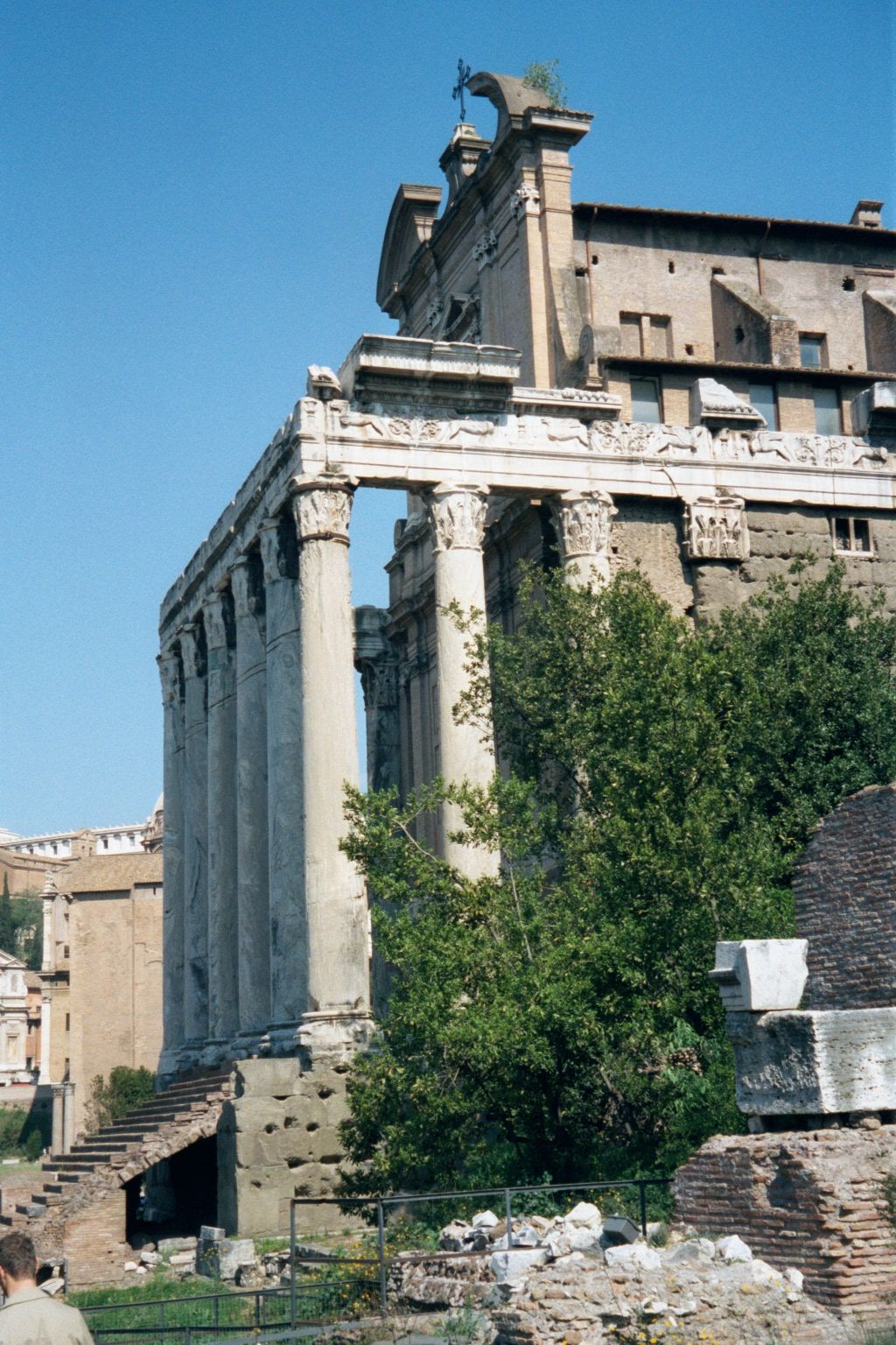 Next to the west, the Temple of Antoninus and Faustina, dedicated to Antoninus Pius and his wife. St. Lawrence was tried here before being b