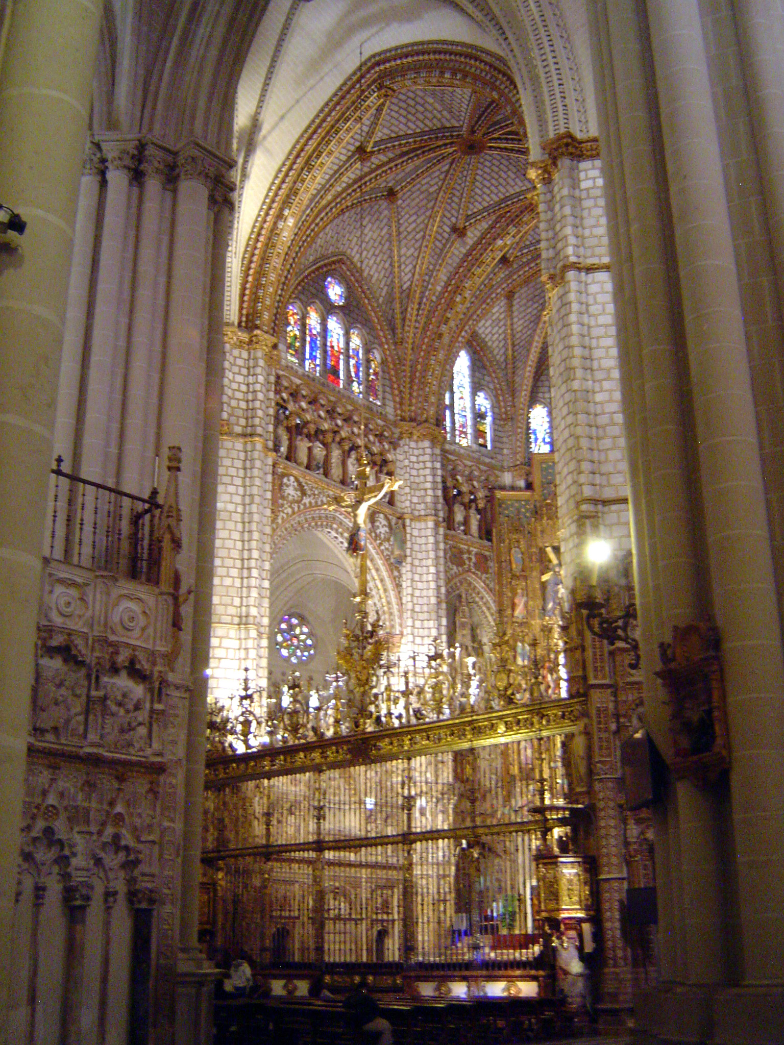 A view from an aisle of the reja or screen before the main altar.