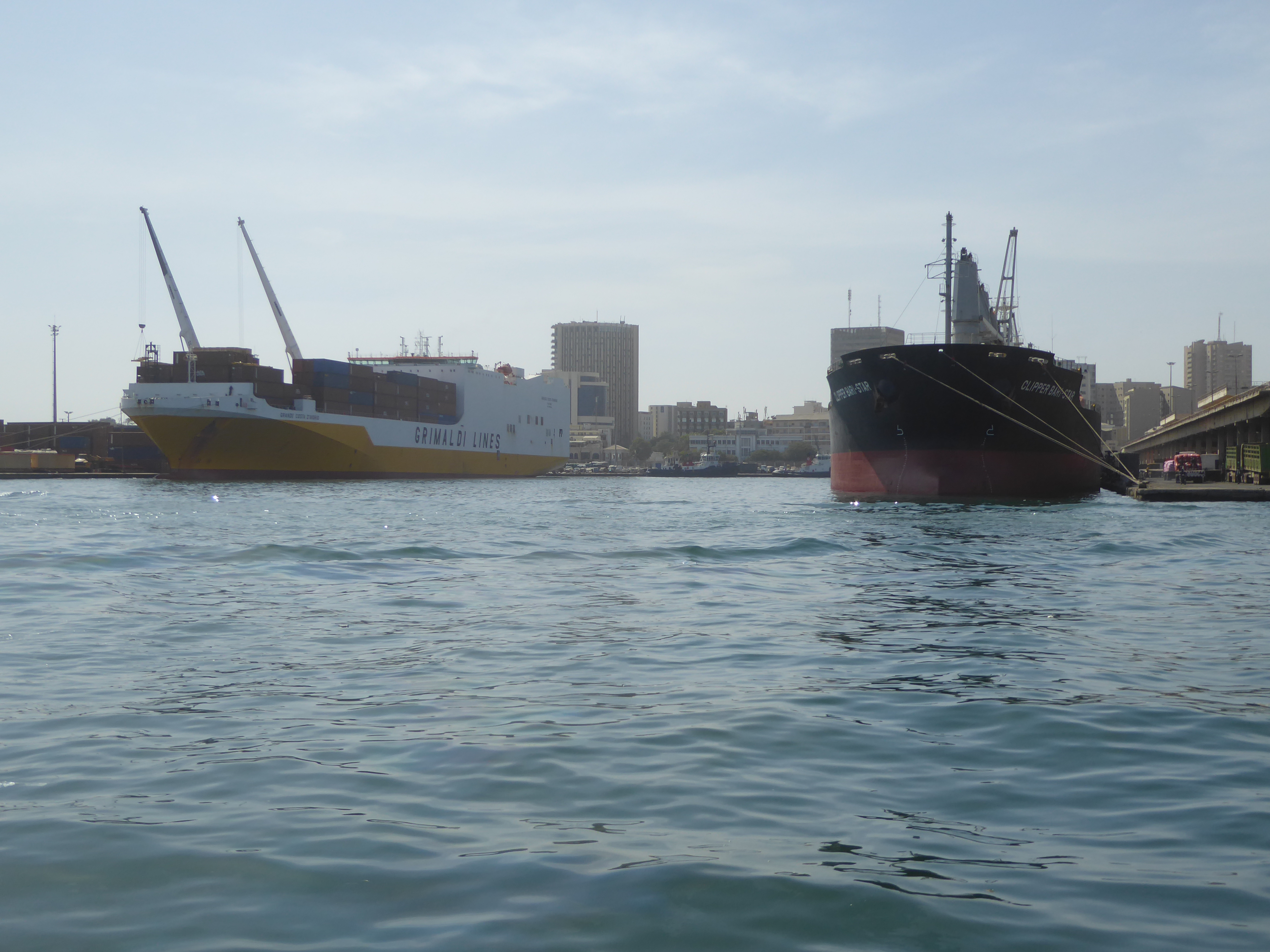 Here's an Italian-owned geared container ship, so-called because it has its own cranes with which to pick up and drop off containers at smal