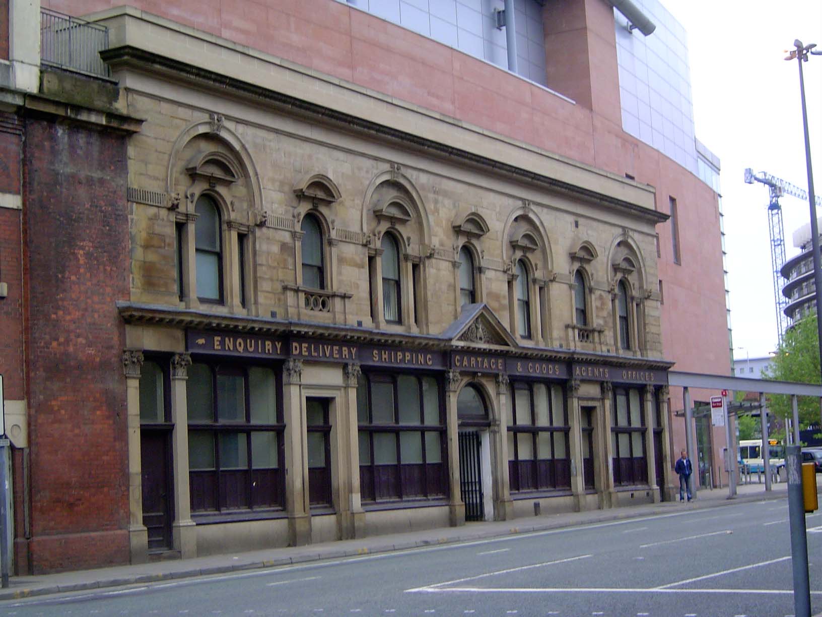 At one end of the station the obsolete and truncated freight station survives, or at least its facade survives, either by accident or intent