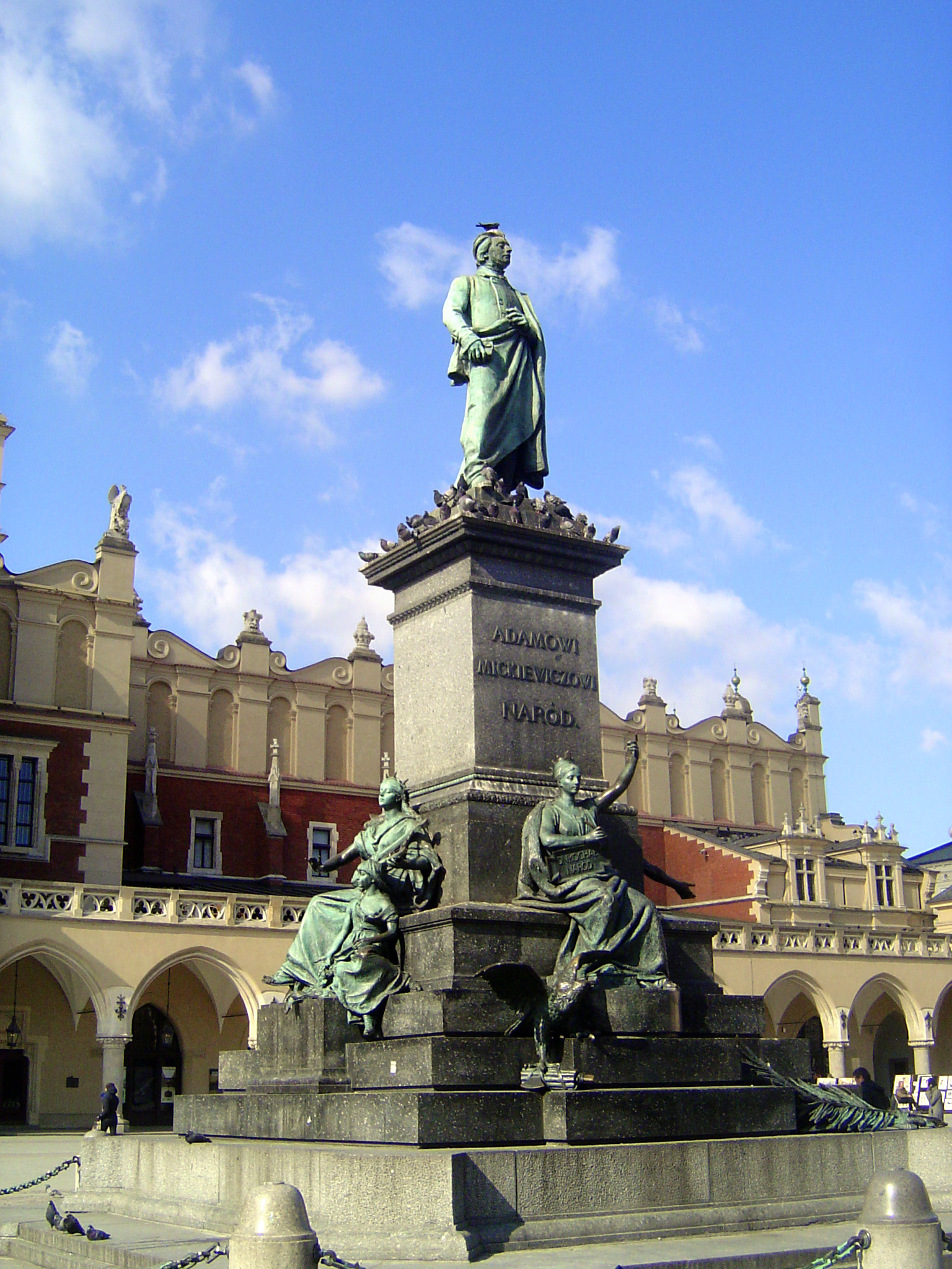 On the far side of the Cloth Hall there's a monument to the poet Adam Mickiewica, who died in exile in 1855. His relations with the Czar of
