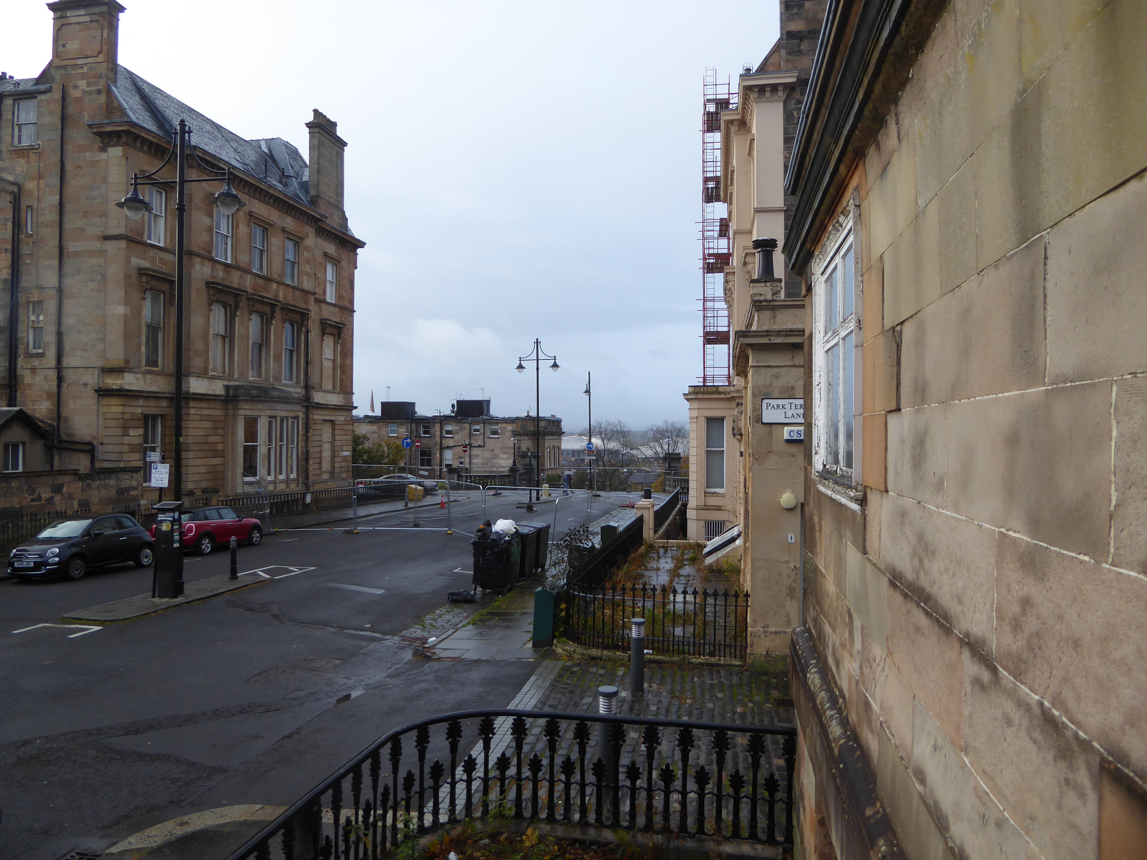 And here's the view from as close to it as a tramp can get. The view is toward a broad flight of stairs. The river, lost in the distance, is