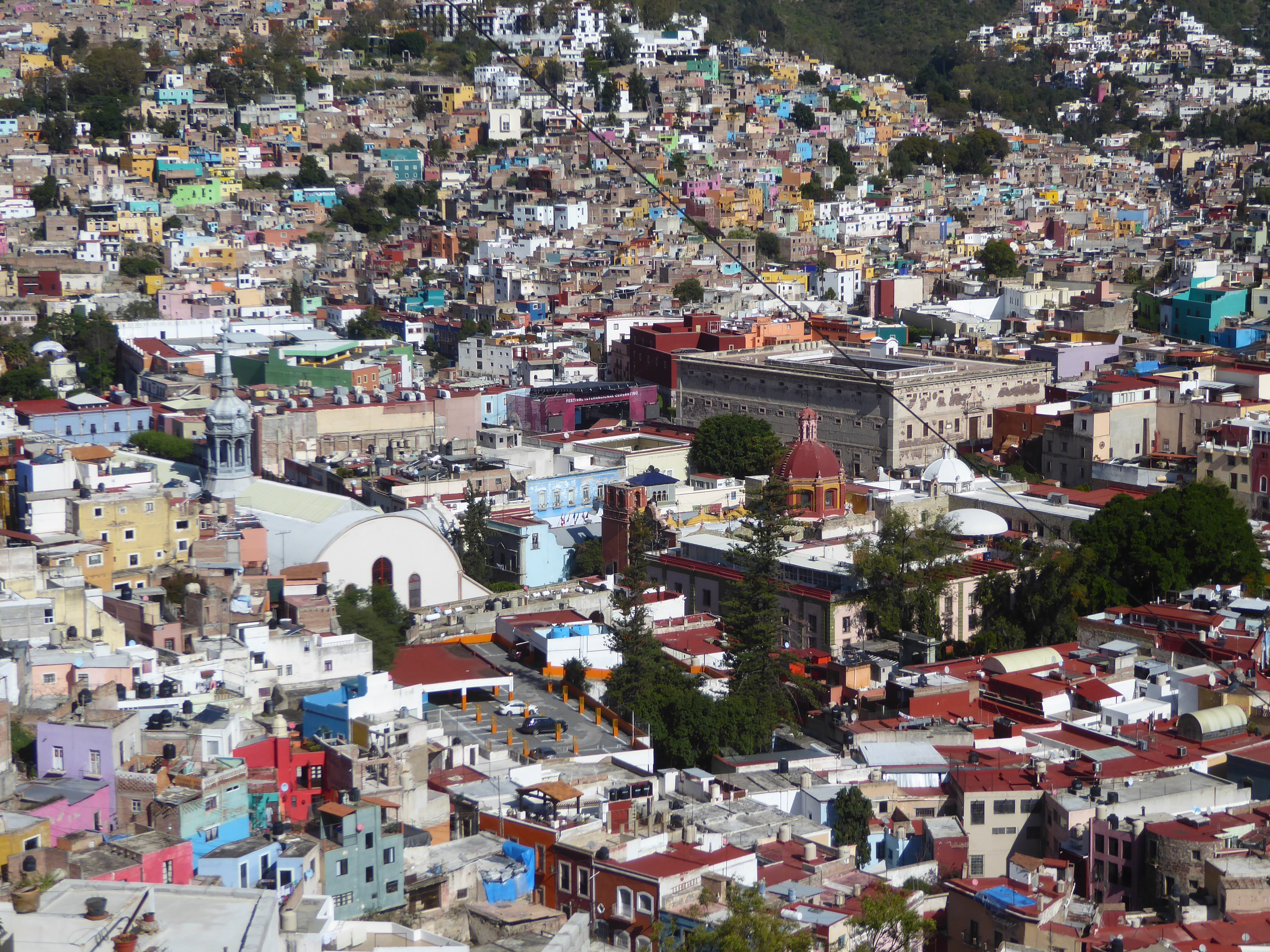 We're back up on the ridge and looking down to a point about 500 meters west of the basilica. That's the cylinder-vaulted Mercado Hidalgo on