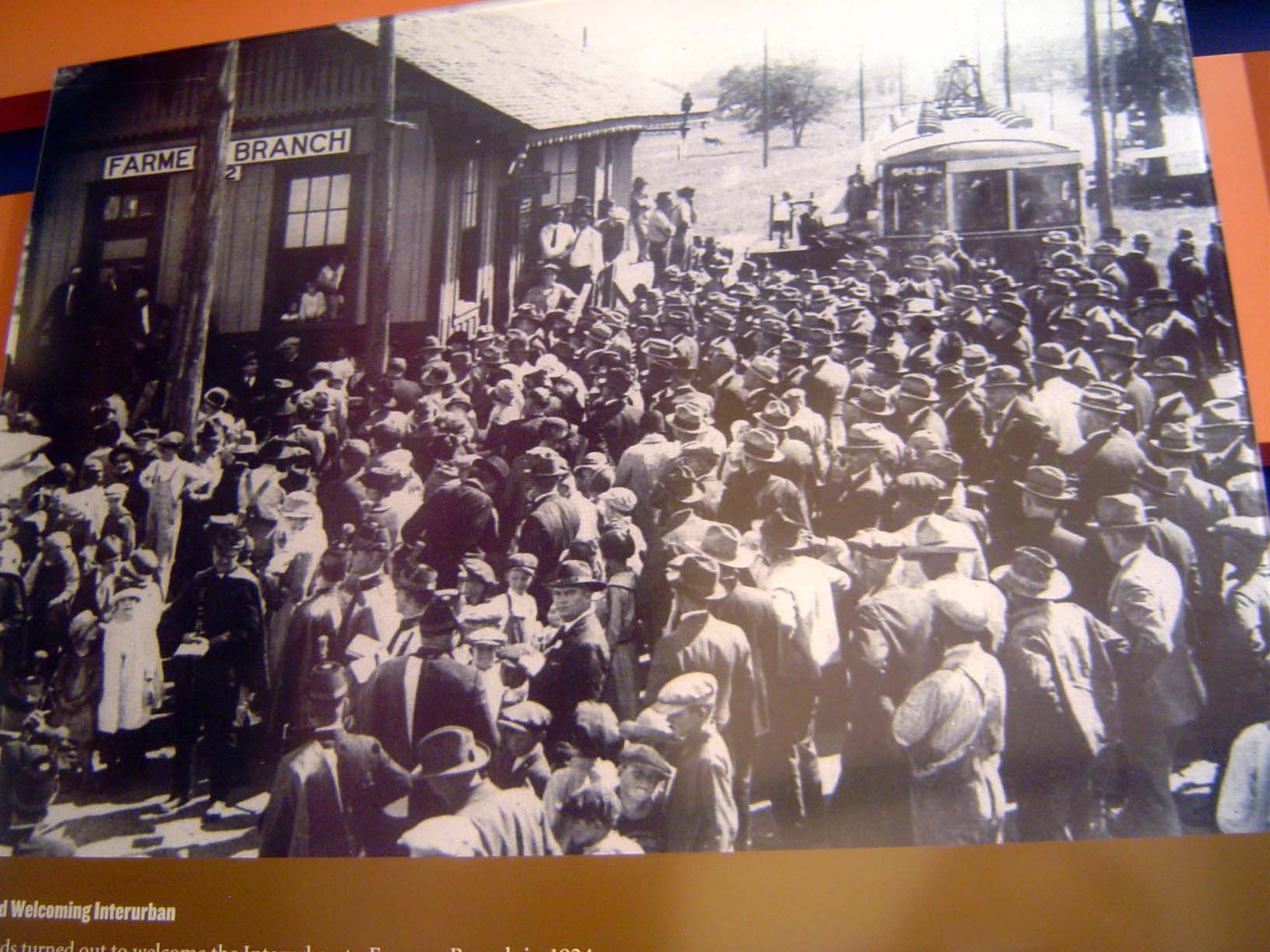 A crowd celebrates the arrival of a Texas Interurban Railway train at Farmers Branch, a dozen miles north of Dallas. This was 1924, late in