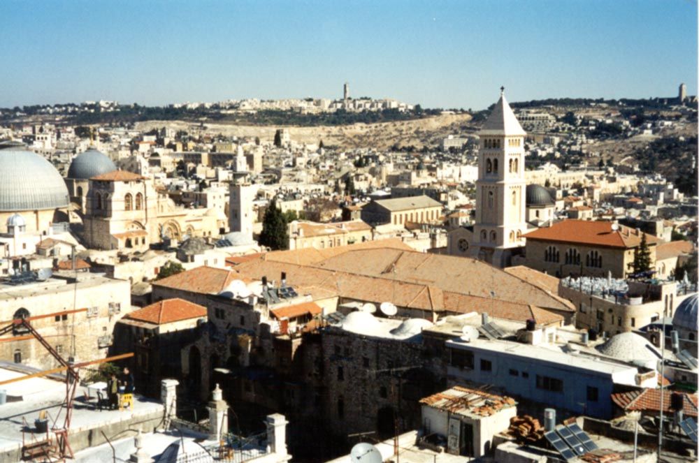 The tower at the center-right is the Lutheran Church of the Redeemer, built in the 19th century to typically high German standards. Between