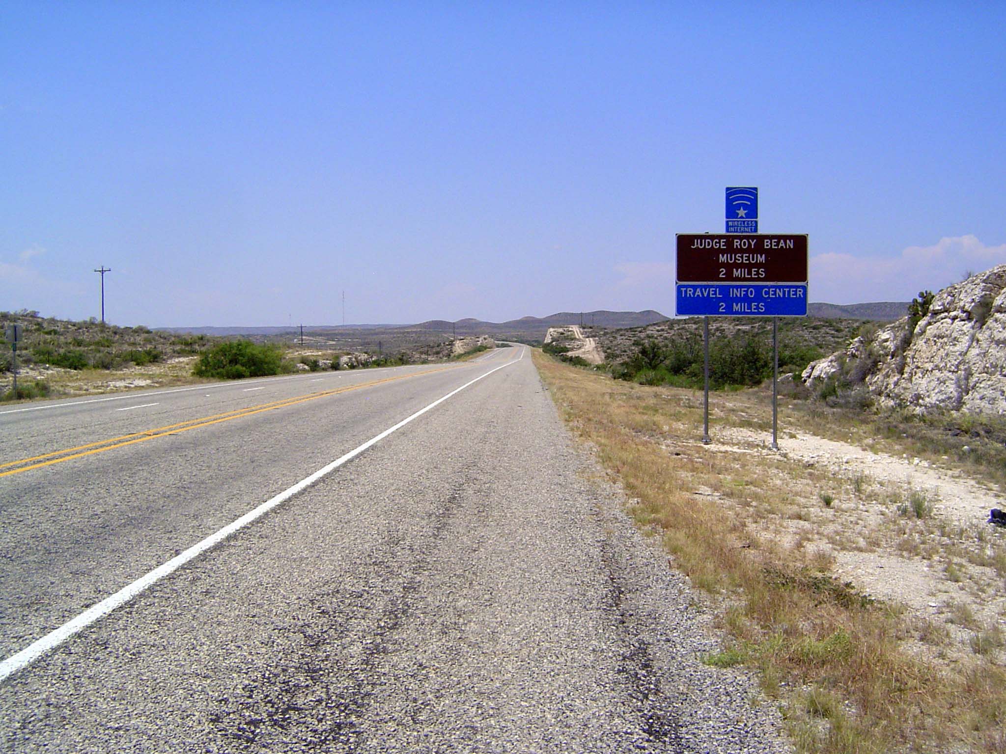 Continuing west, U.S 90 here approaches Langtry, the home of Law West of the Pecos. Roy Bean, a storekeeper, was appointed justice of the pe