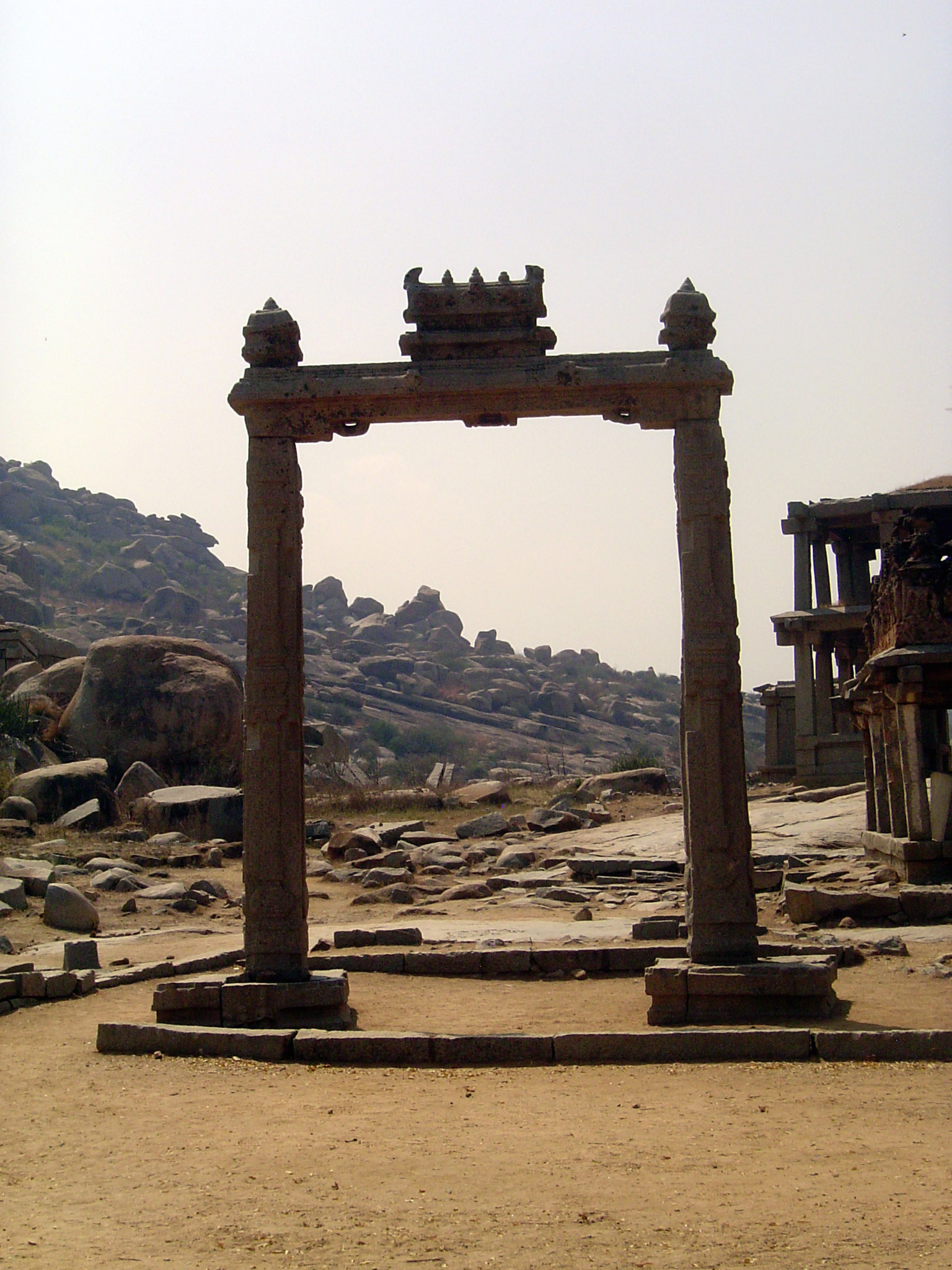 We're going to walk back toward Virapaksha. First up, the so-called King's Balance, properly the Tulapurusha-dana Monument.