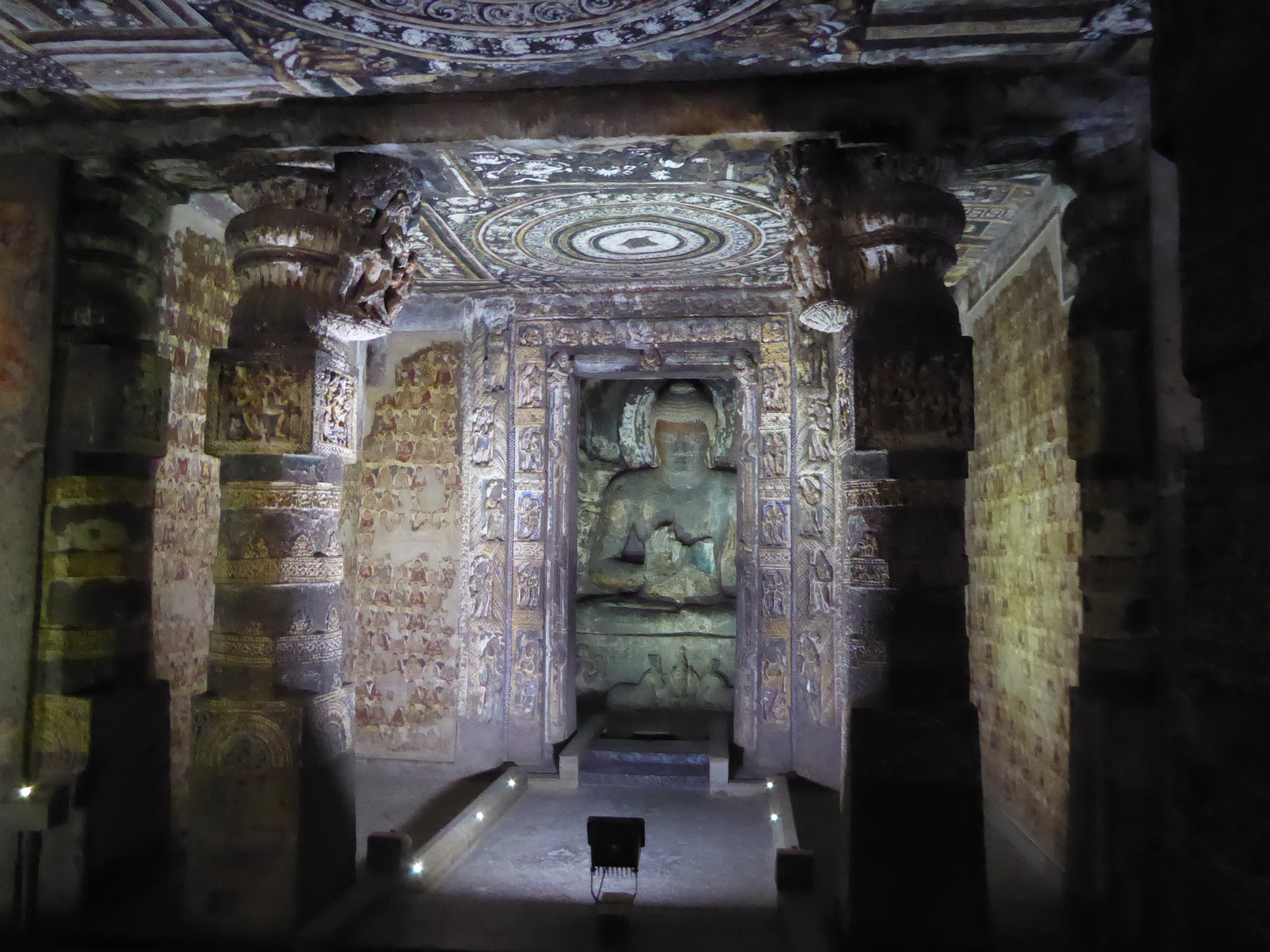 The Miracle of Shravasti appears again around the shrine in Cave 2. The story is that the Buddha was confounding skeptics by appearing in a