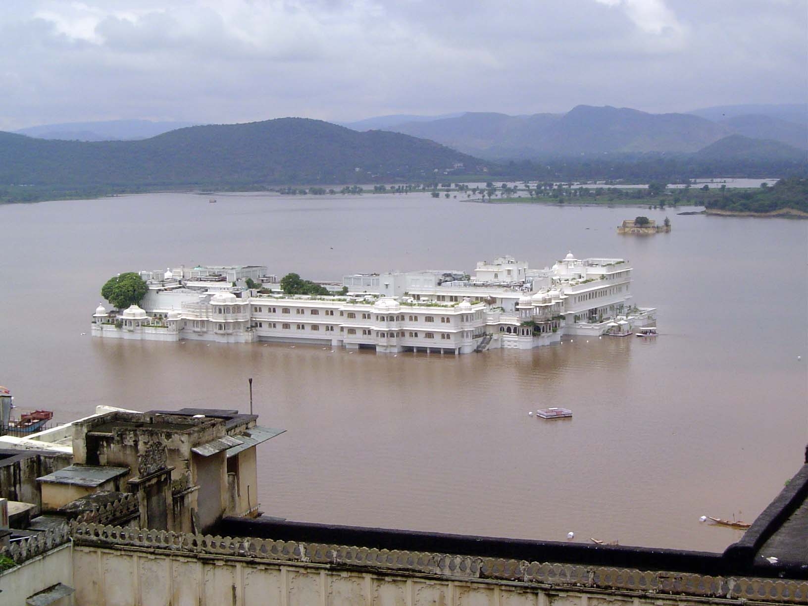 The lakeward view is over the famous Jag Niwas, or Lake Palace, now a hotel run by the Taj chain. The lake is very shallow, and a week befor