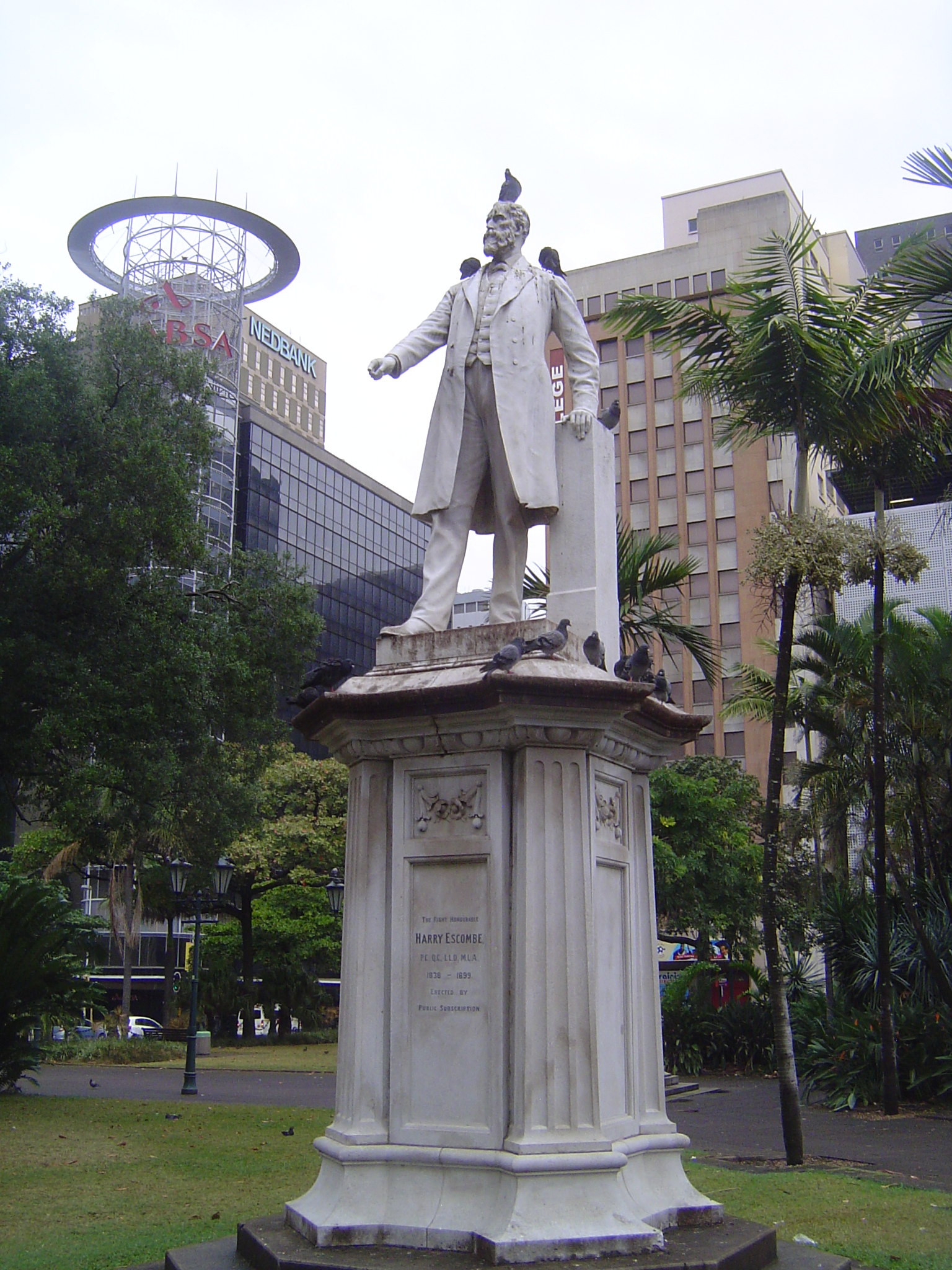 On his plinth.