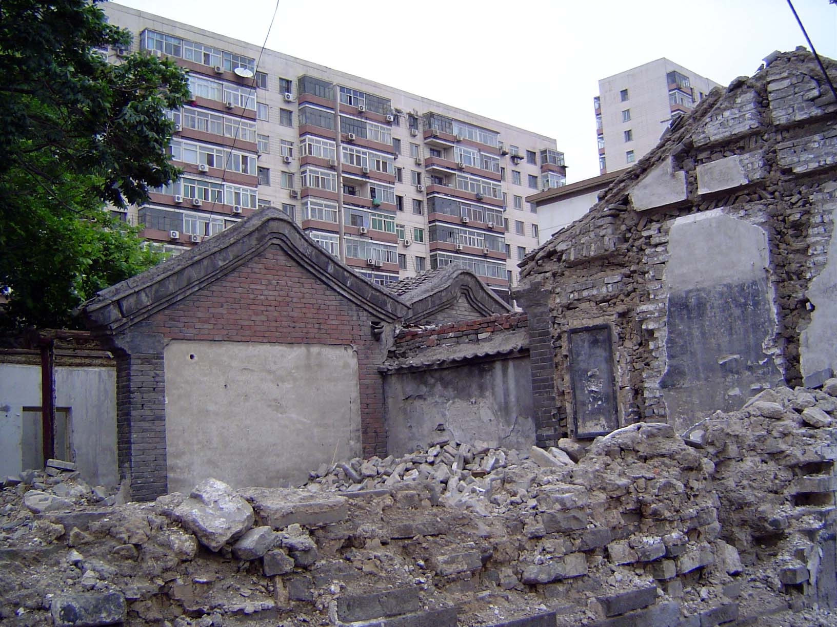 As the houses are torn down, their structural solidity is revealed.