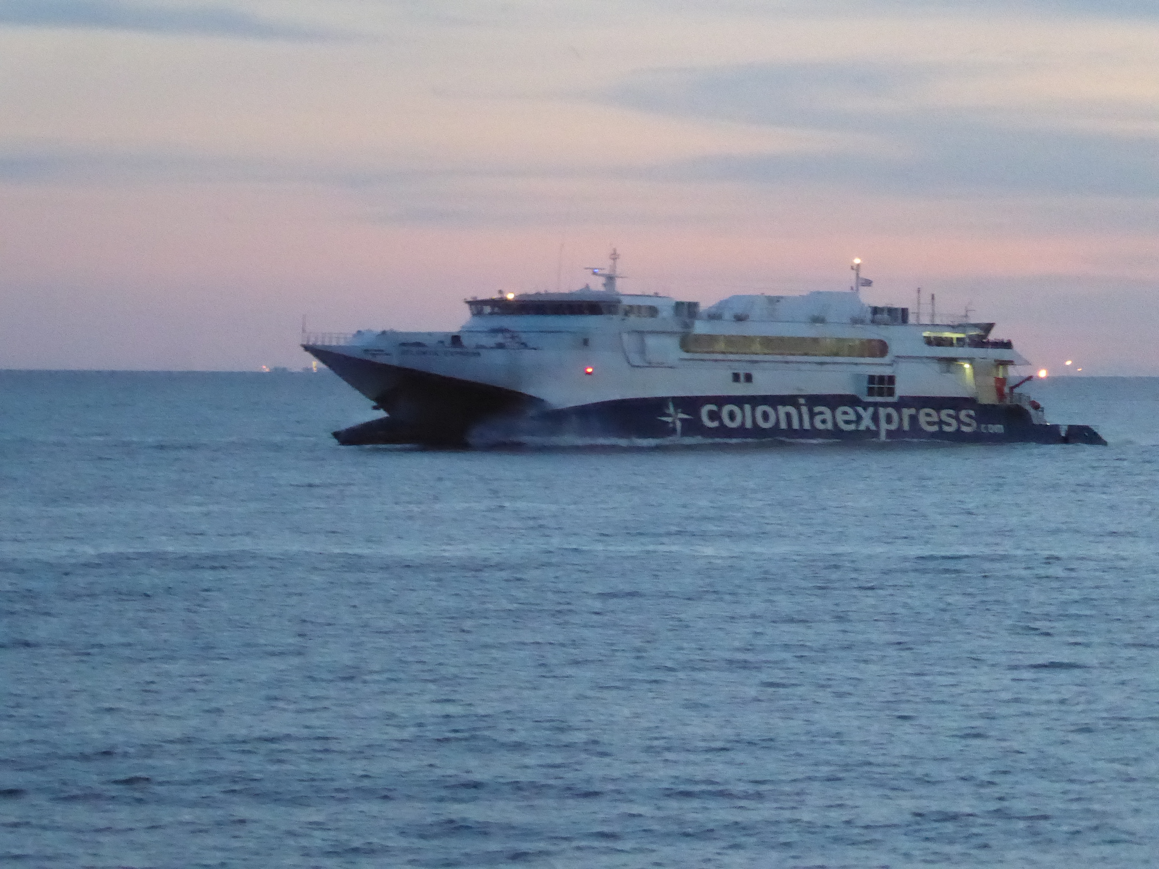 A ferry from Buenos Aires arrives at dusk; it's a 50-minute trip.