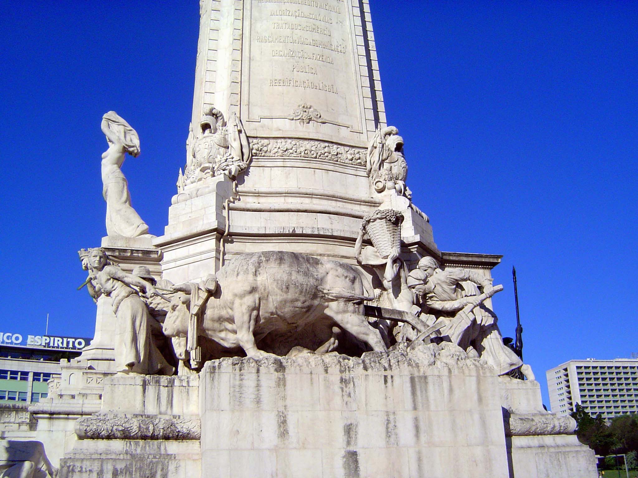 The base of the statue celebrates honest labor, or at least hard labor.