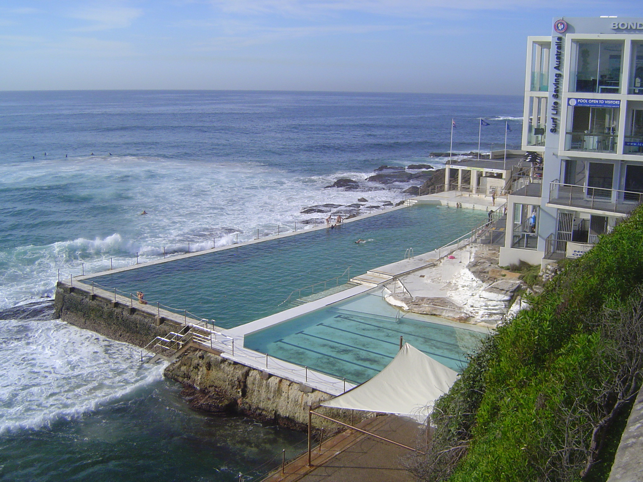 Swimmers, as distinct from surfers, may prefer the Bondi Icebergs pools above the south end of the beach. They were built after the Bondi Ic