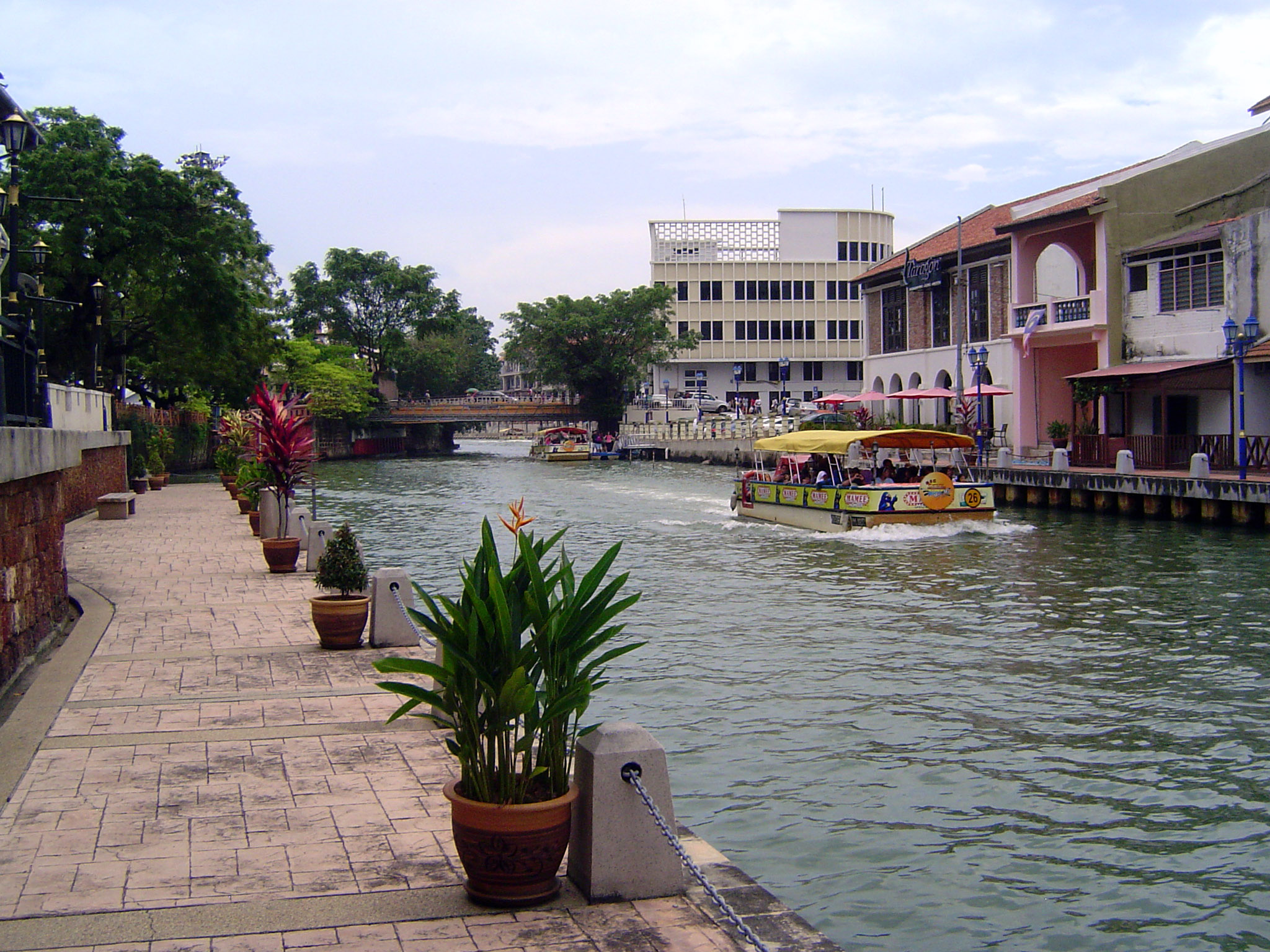 The river has been much improved, with tour boats cruising up and down. Pity the iguanas of once upon a time. The traffic has driven them up