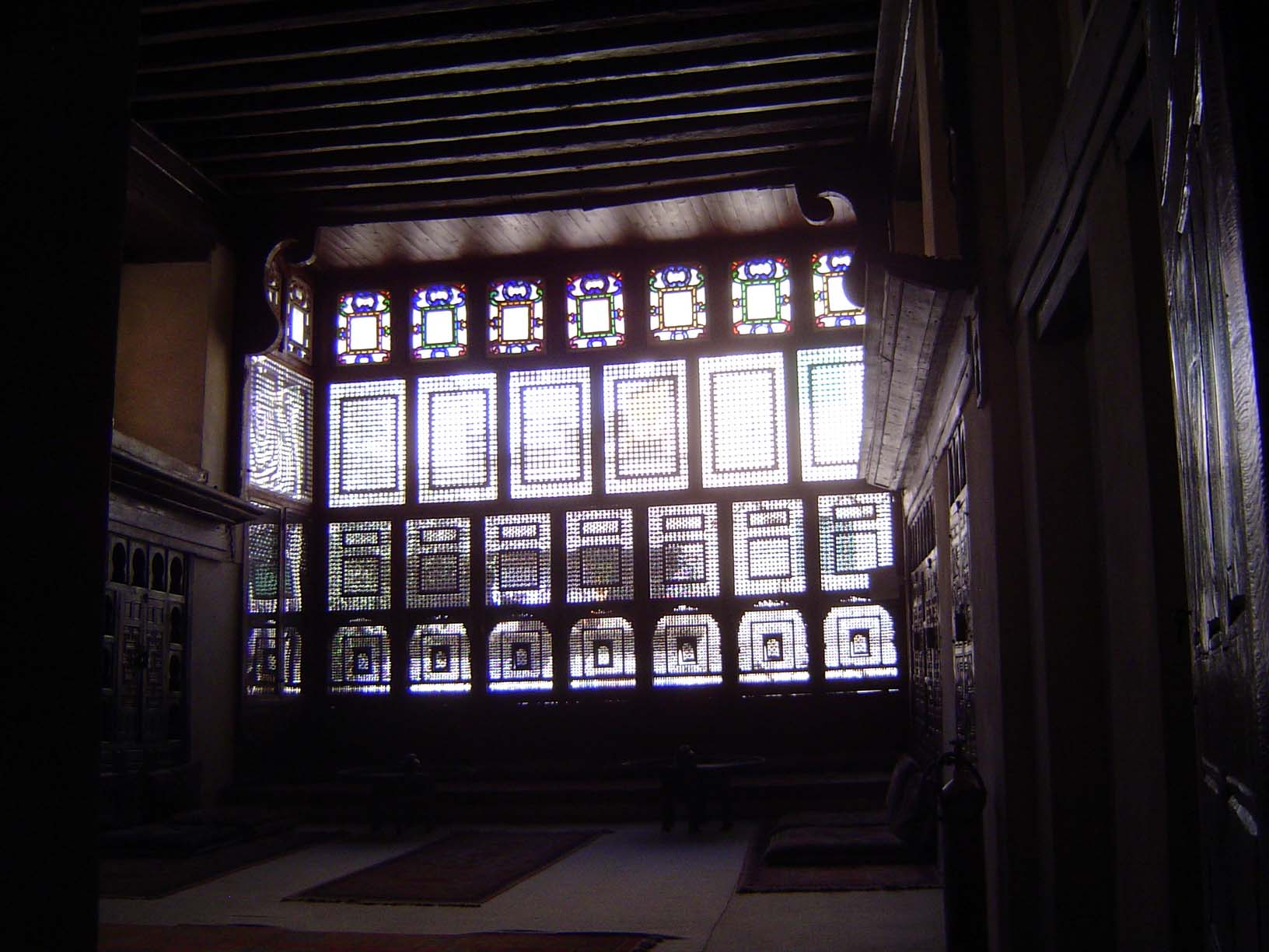 Elaborate mashrabiya, a wood screen that gives privacy and reduces the painfully bright light.