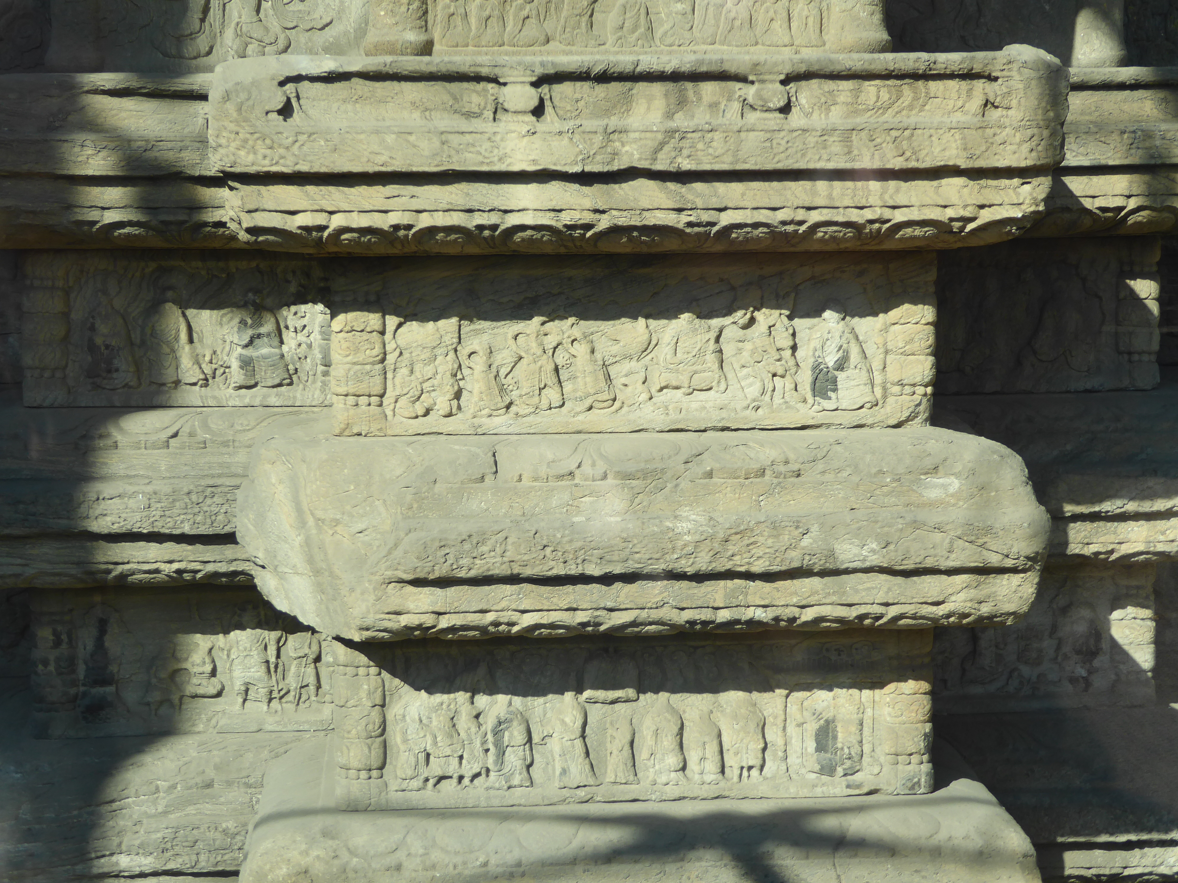 The bottom tiers illustrate the monks who brought the Buddhist canon to Korea.