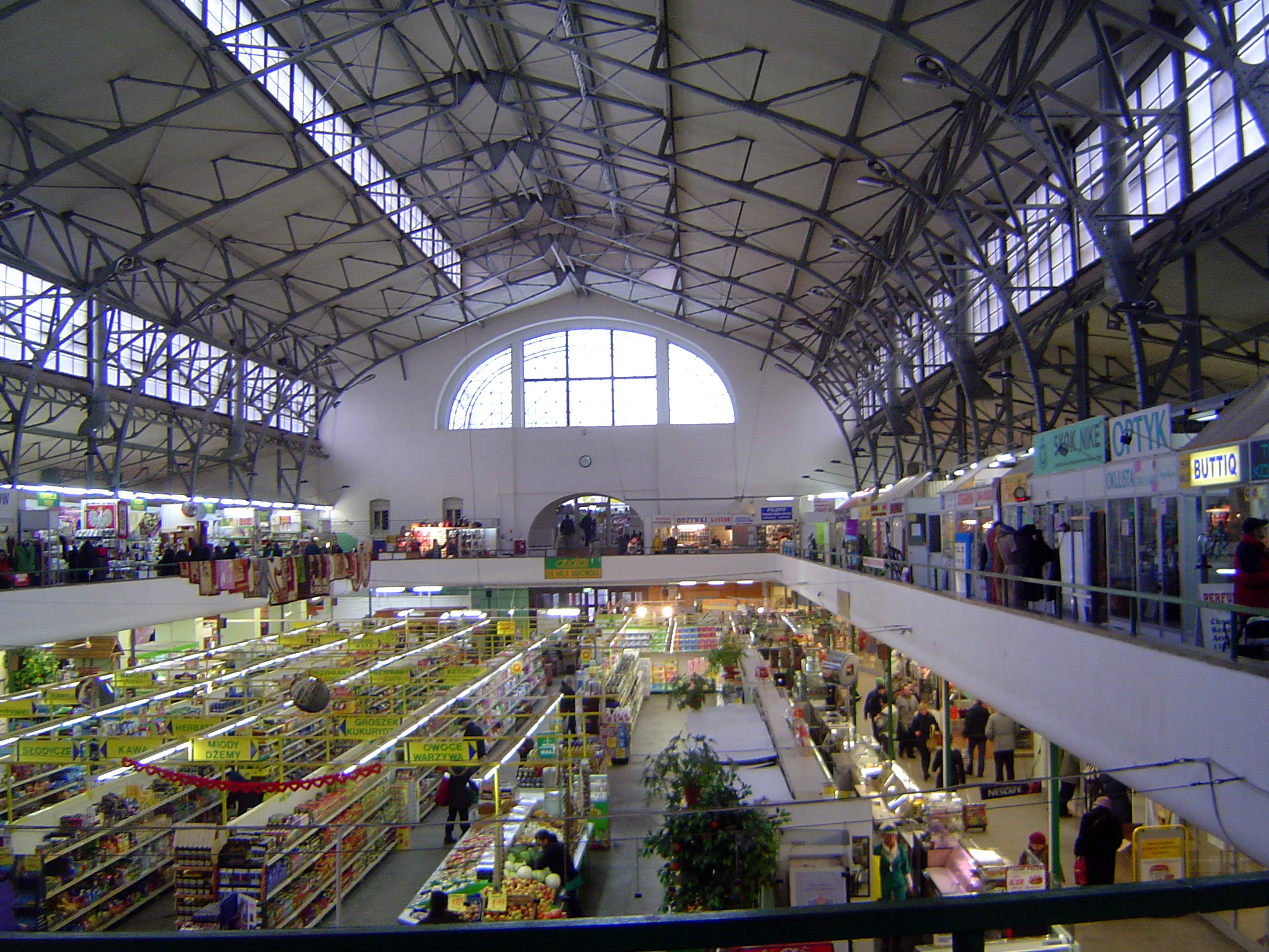 Inside there's a supermarket, more efficient and less colorful than the stalls it replaced.