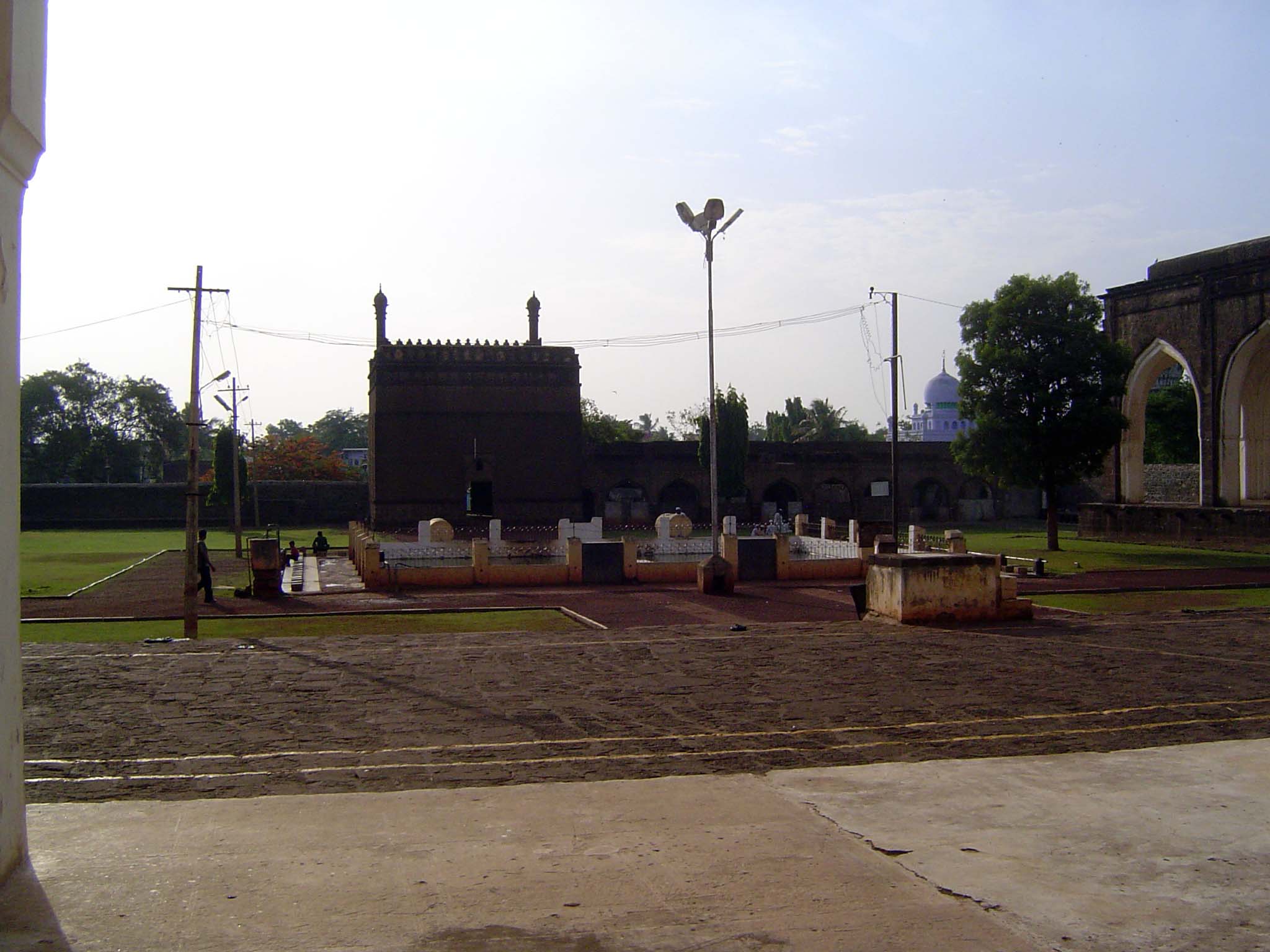 The courtyard was supposed to extend to a grand entrance, but it never happened, unless you count the gateway in the distance.