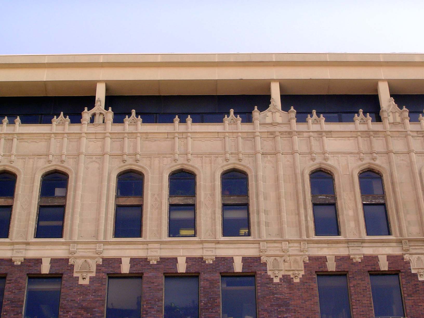 Cornice detail. The top is a later addition, guided by the precept that no building's too good to spoil with some extra rentable space.