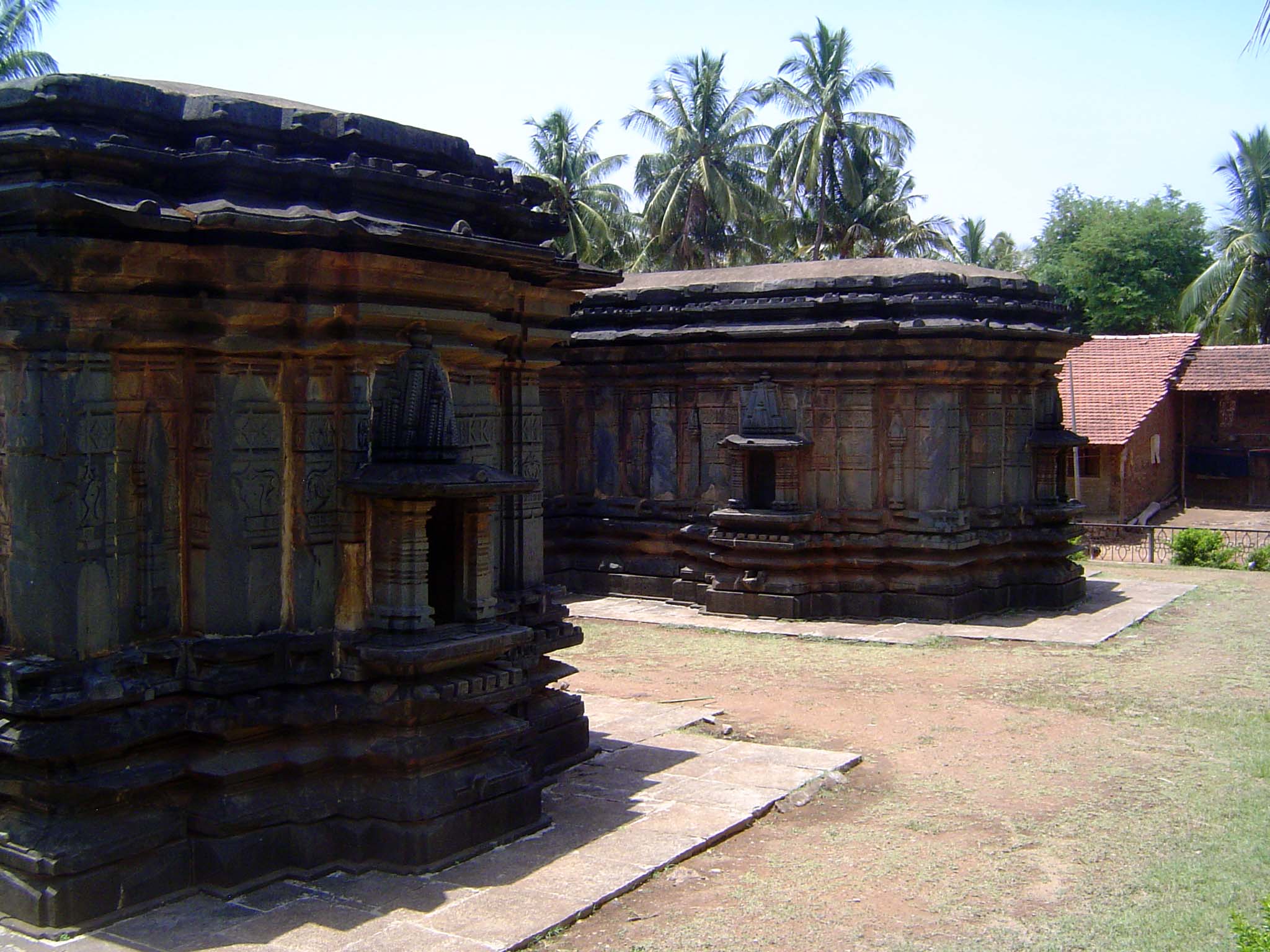 The west side of the temple, with two of the temple's three cells; the central cell is set within the temple and does not project west like